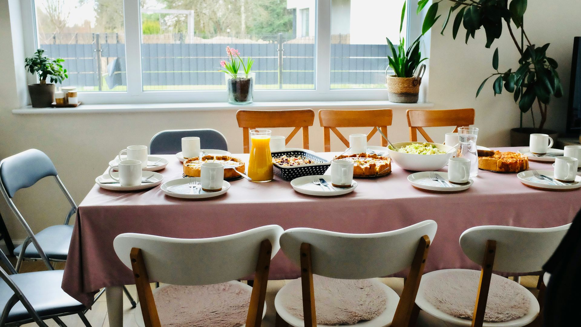 a table with plates and cups on it