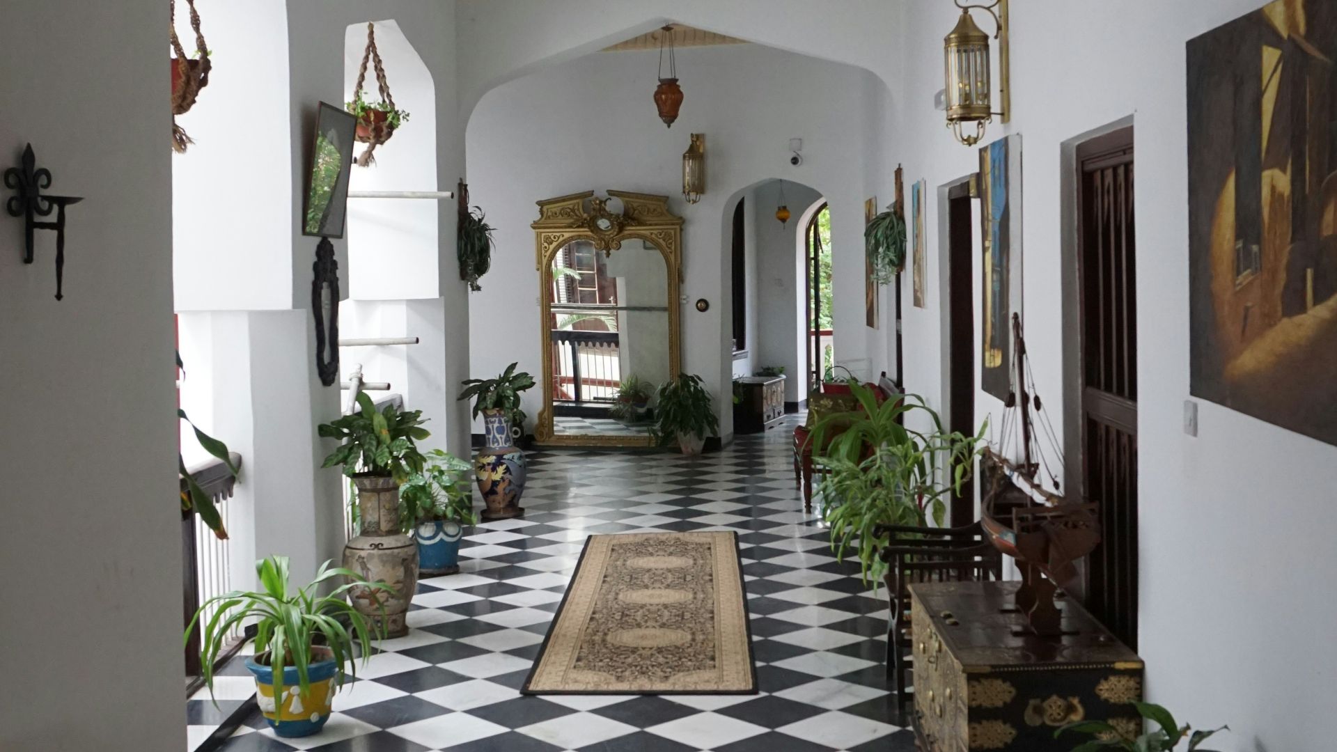 a room with a black and white checkered floor