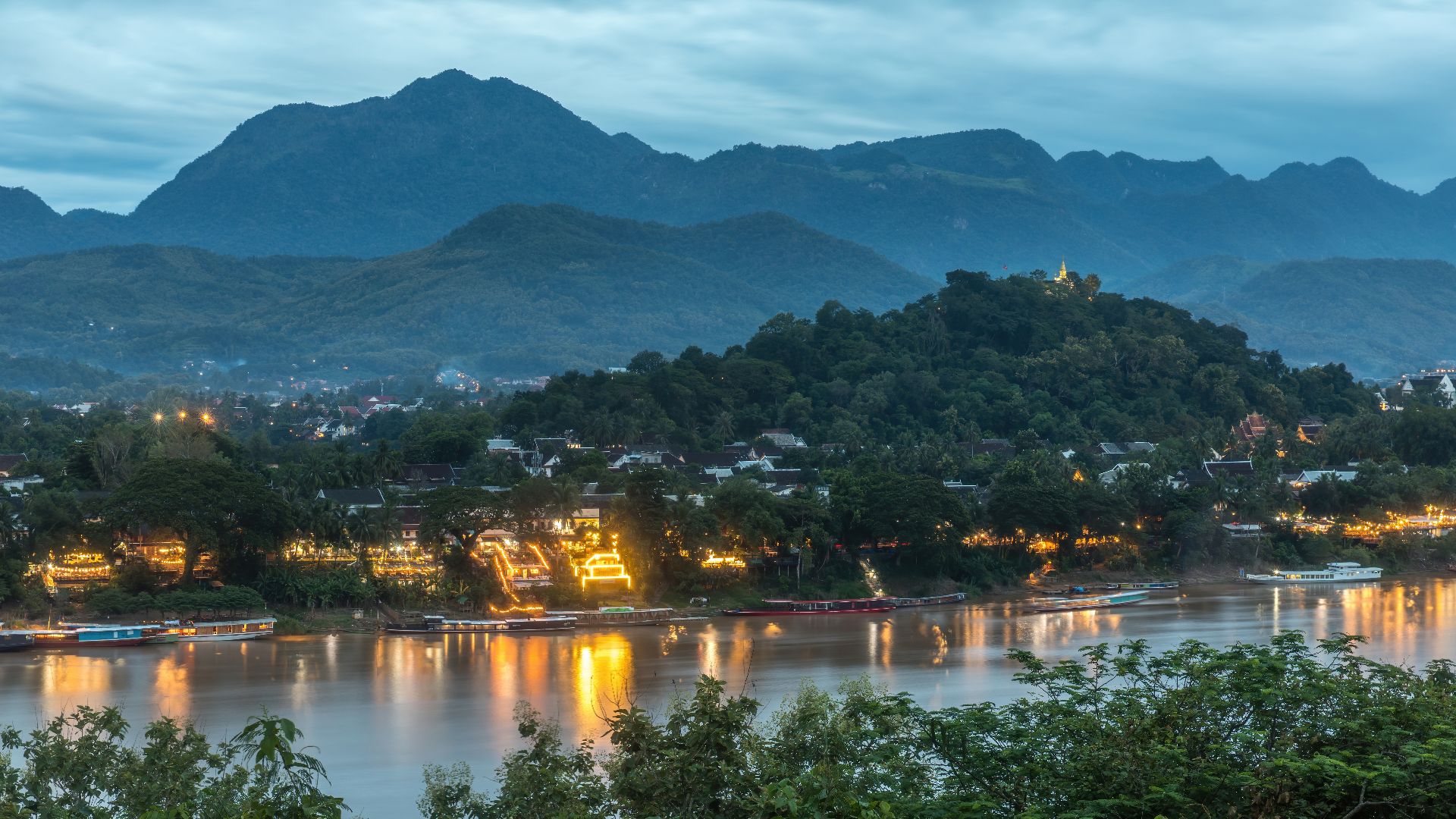 File:View of Mount Phou Si and Mekong bank at sunset seen from Wat Chomphet in Luang Prabang Laos.jpg
