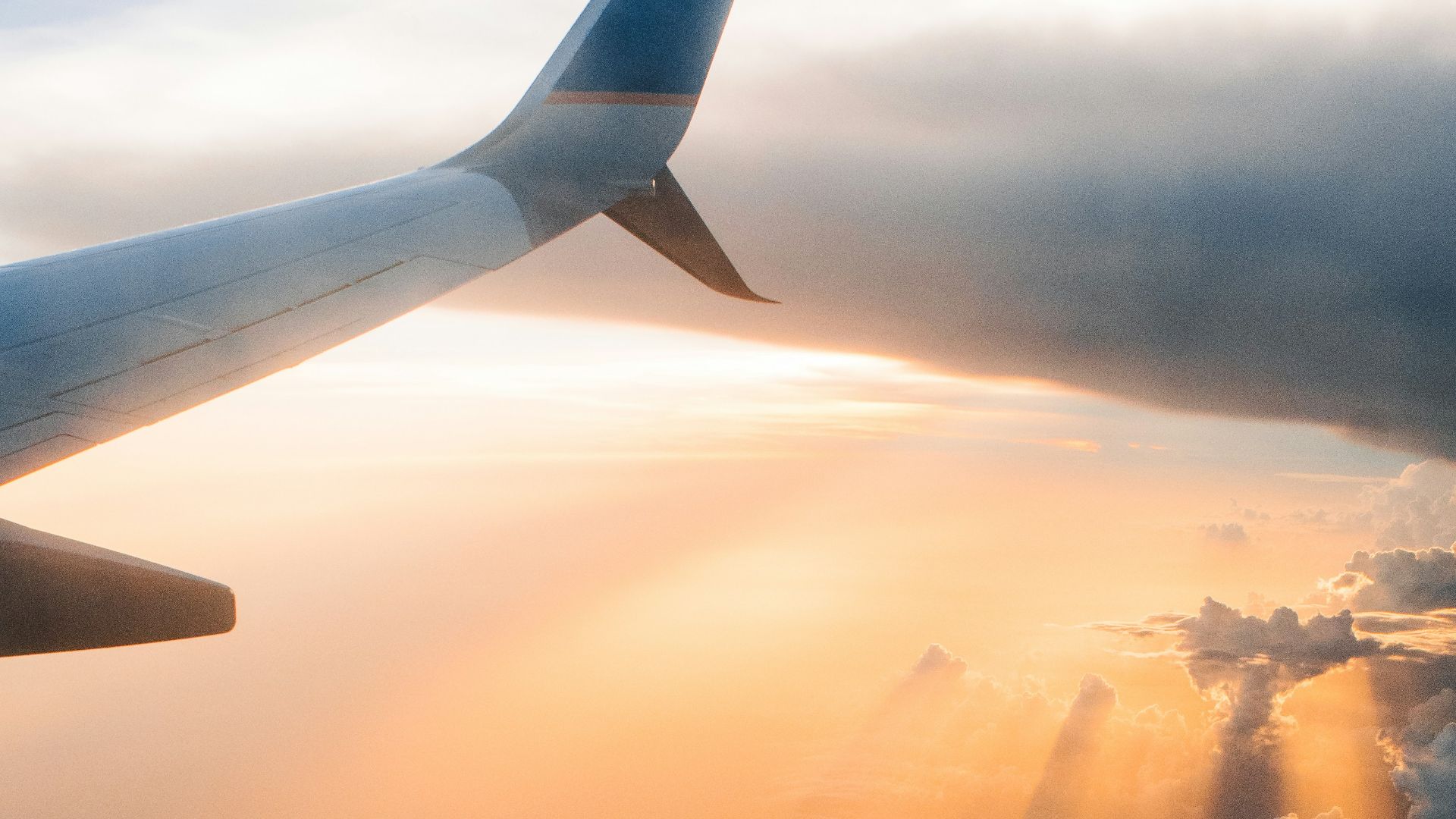 airplane on sky during golden hour