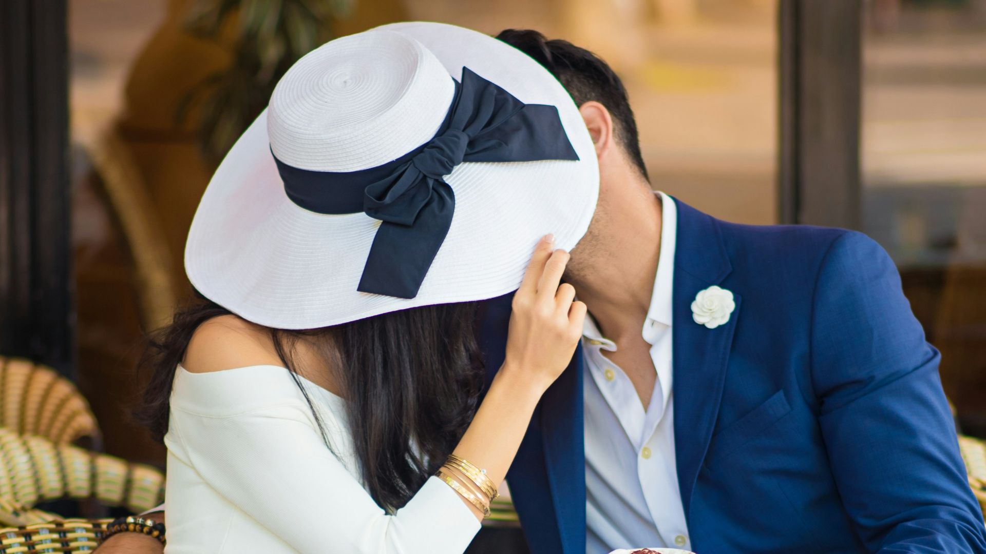 woman in white hijab sitting on chair