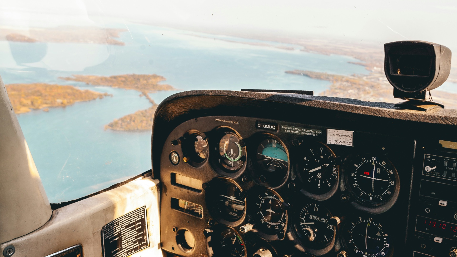 person taking photo inside aircraft