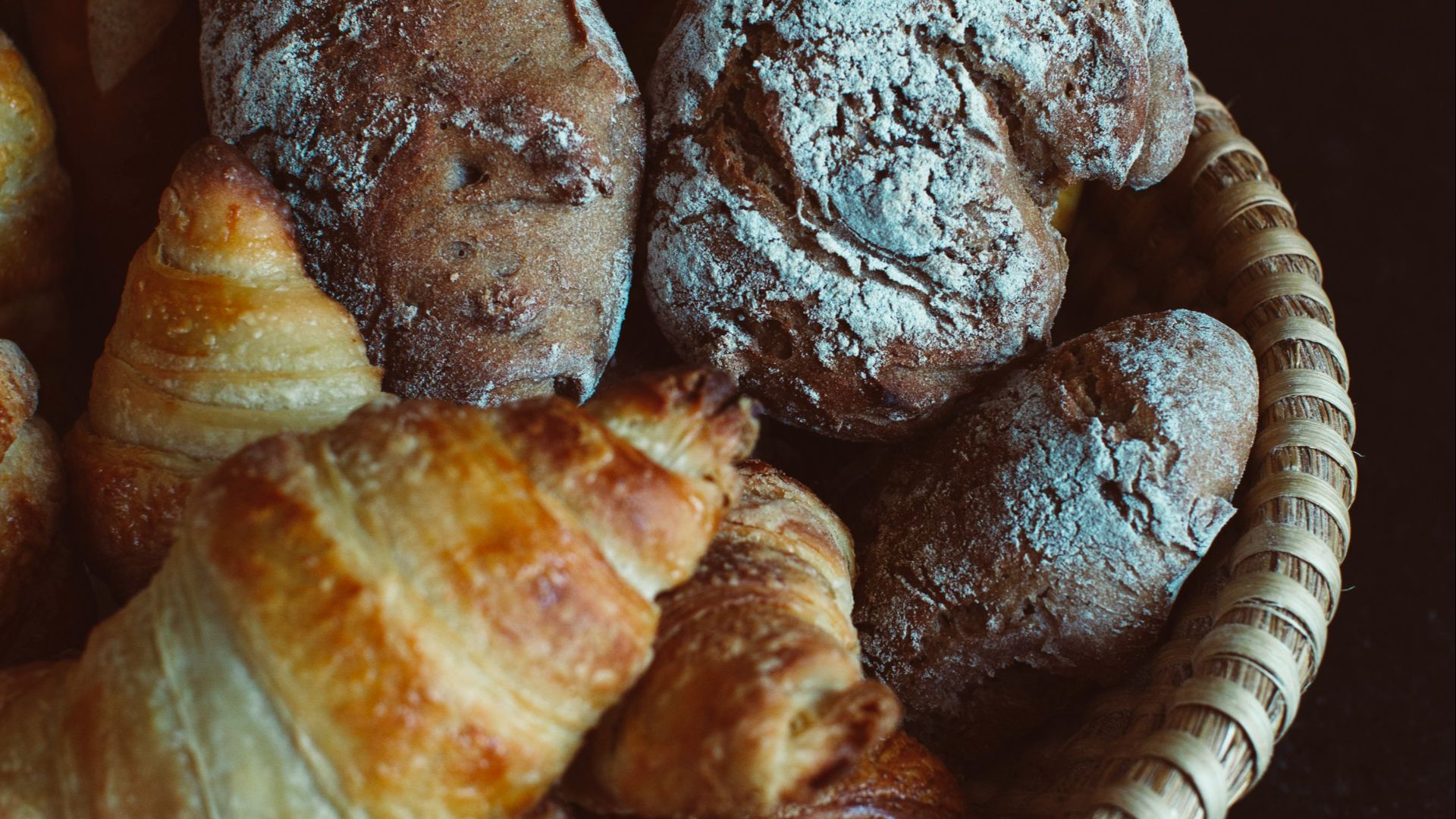 brown bread on blue and white ceramic plate