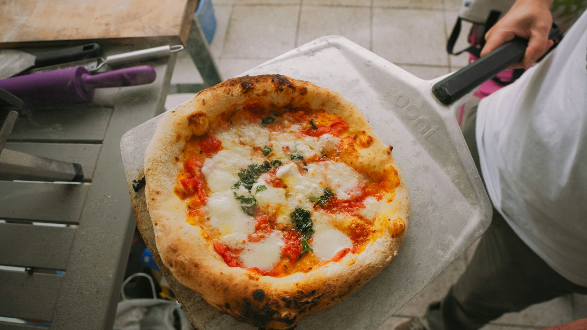 a pizza sitting on top of a piece of paper