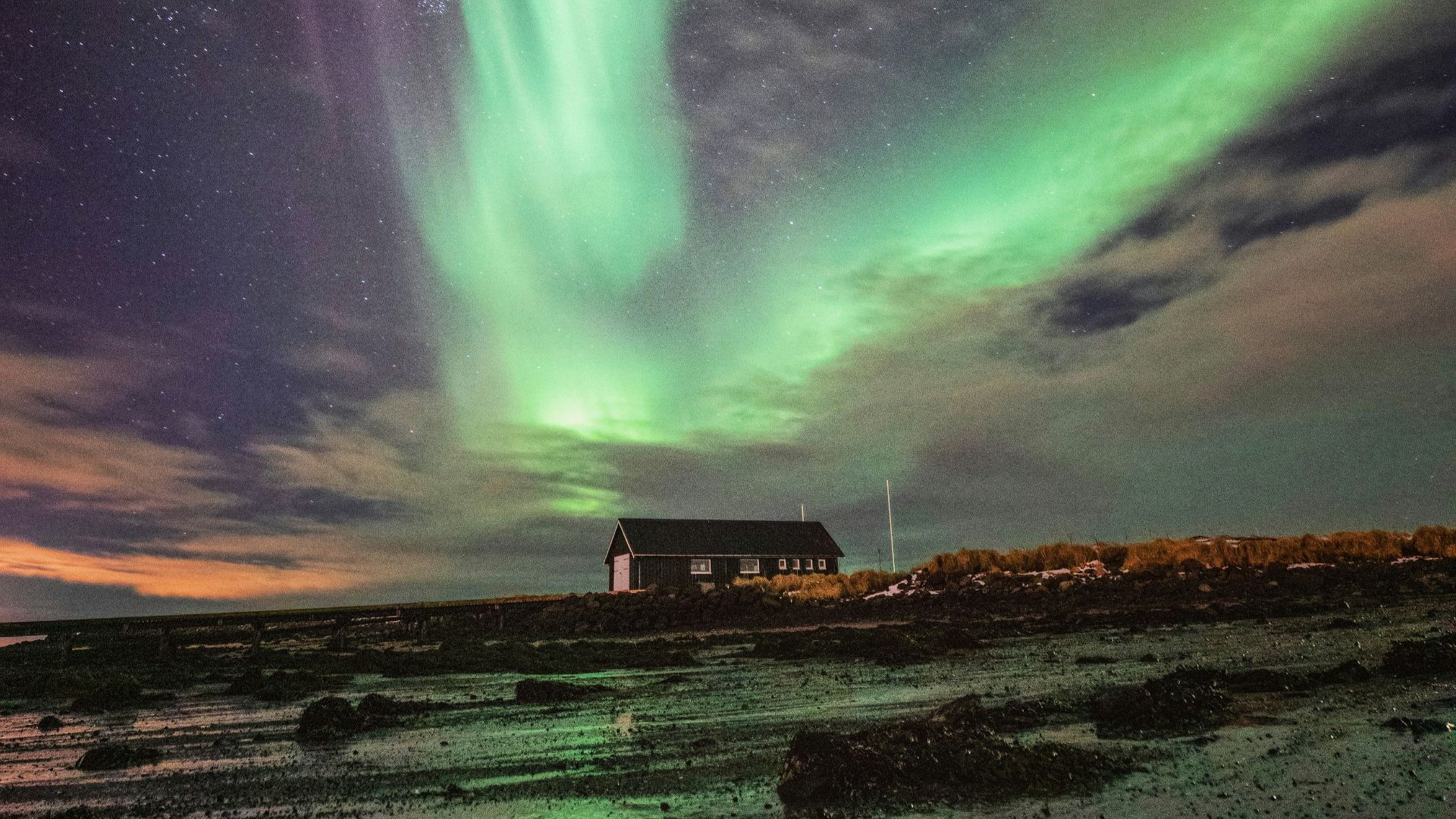 green and blue sky with stars