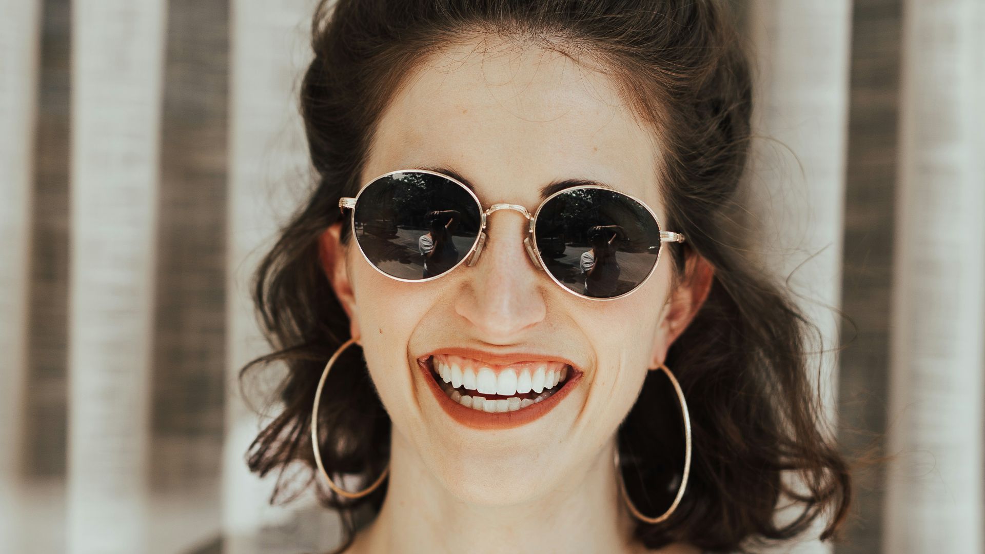 woman wearing white and black rompers and black top