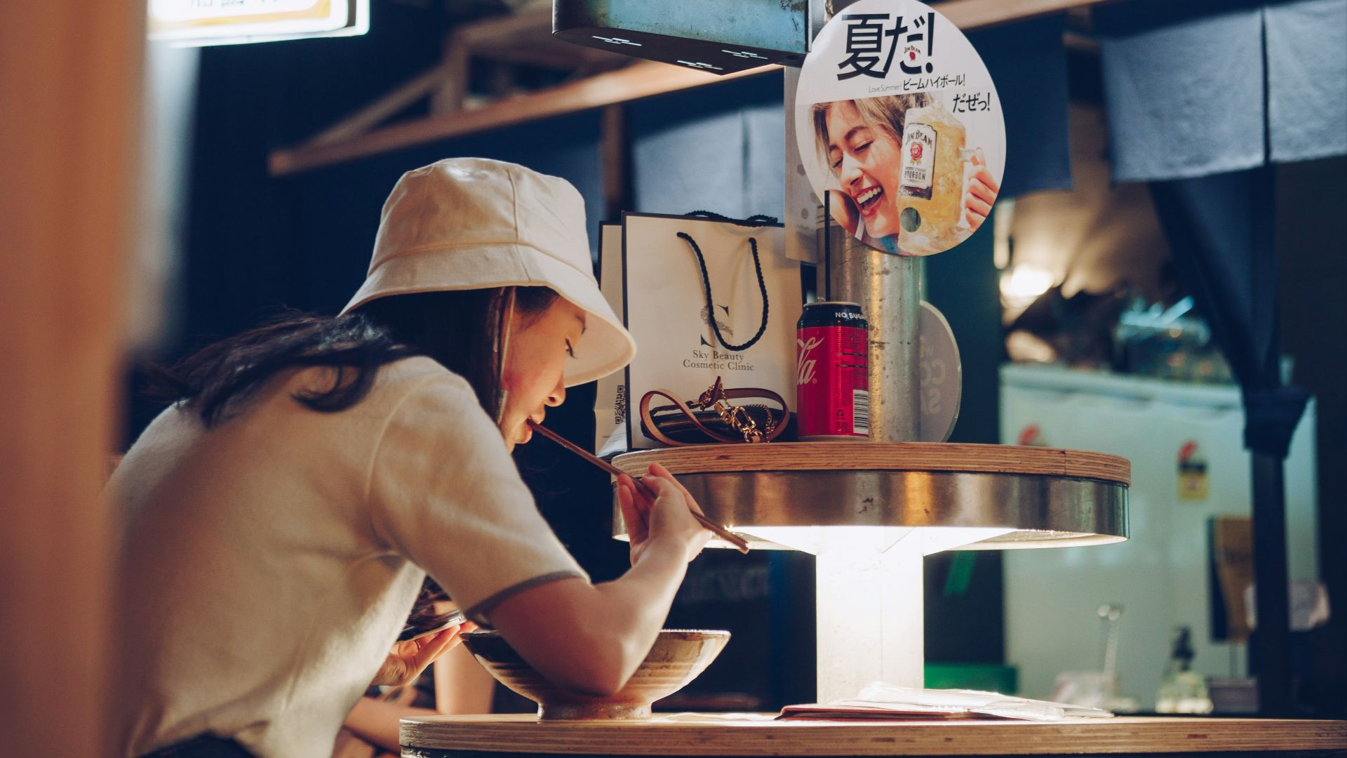 man in brown polo shirt wearing brown hat