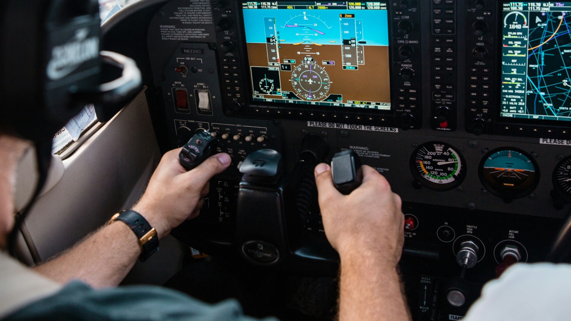 man flying aircraft under cloudy sky