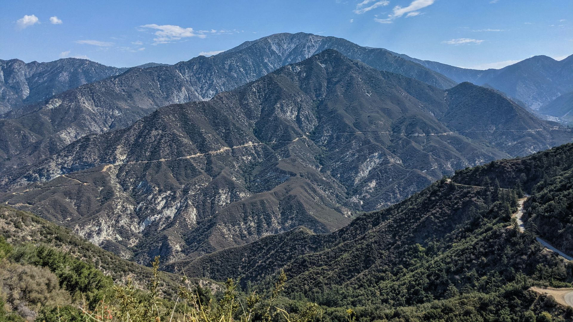 green and brown mountains under blue sky during daytime