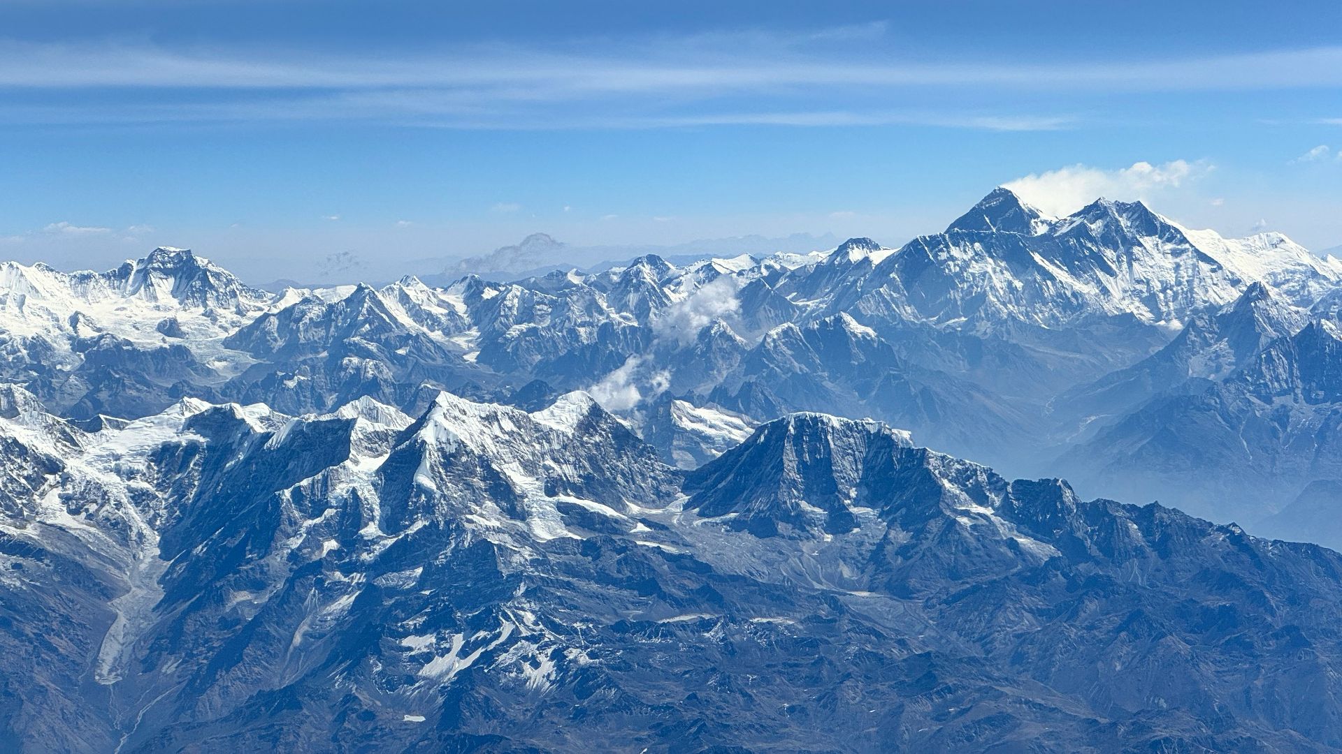 a view of a mountain range from an airplane