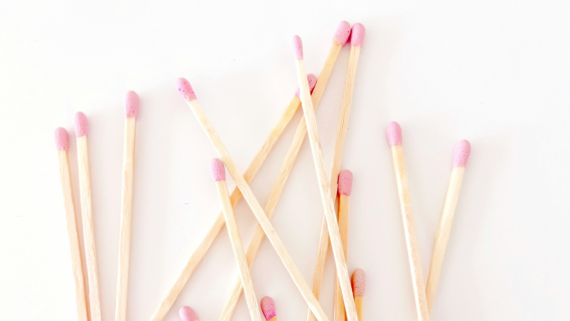 a group of matches on a white background