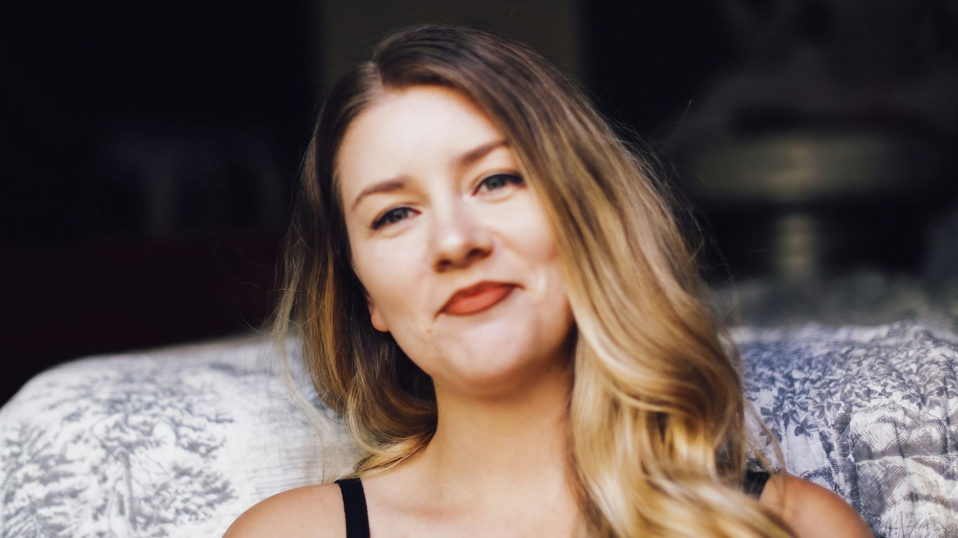 woman in black tank top