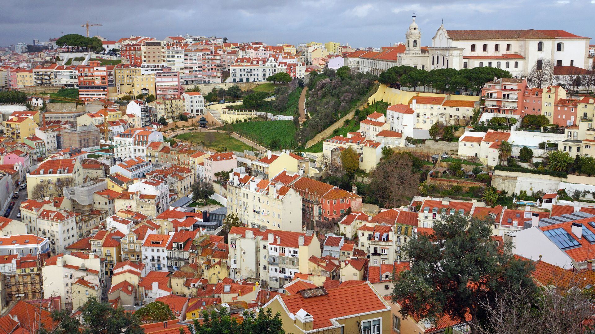 a view of a city from a hill