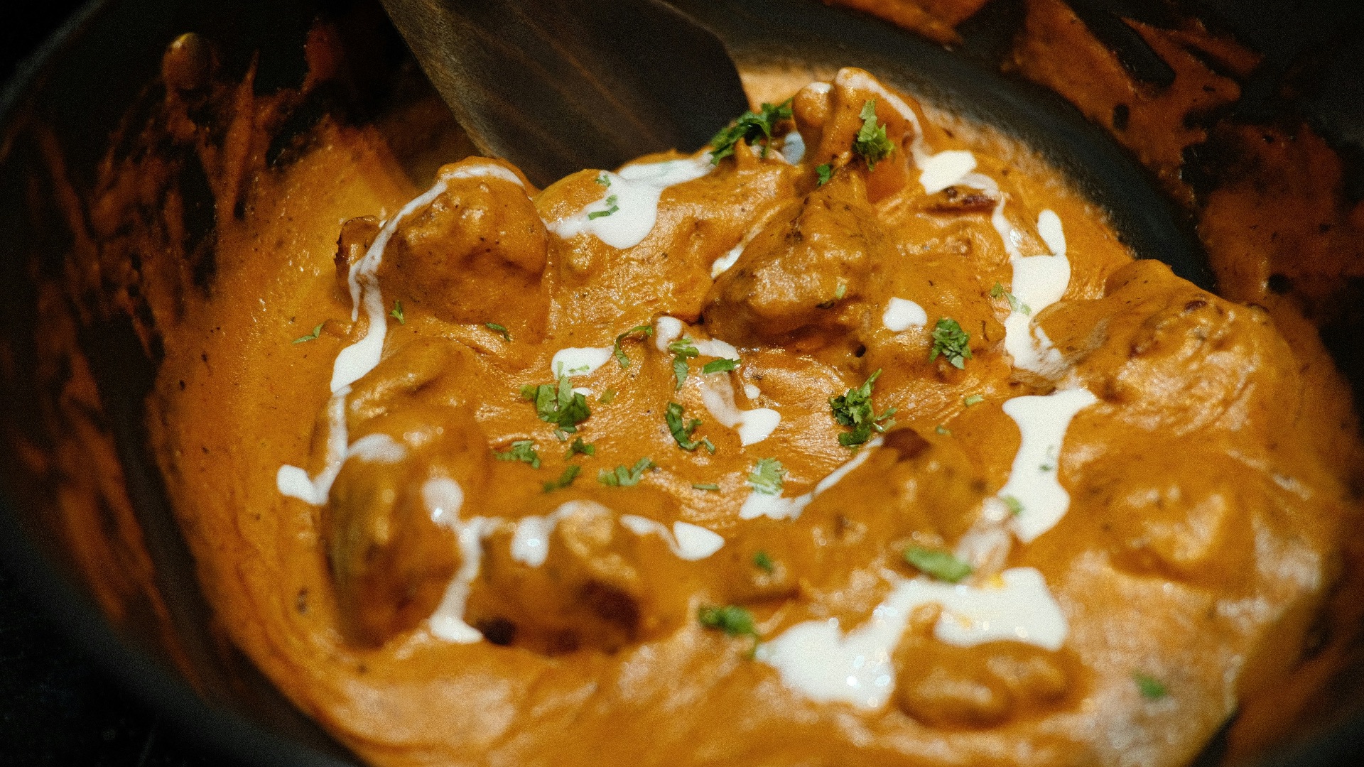 brown and green dish on brown wooden bowl