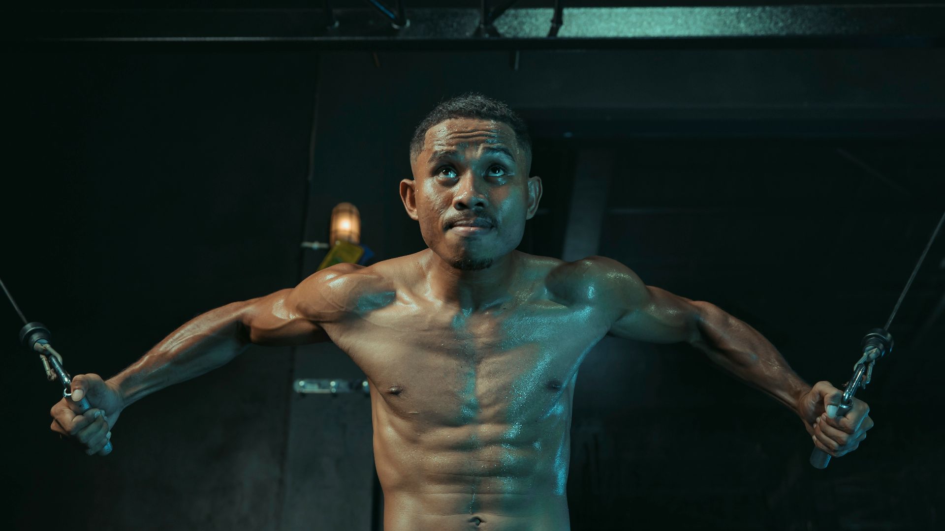 Man is working out in a gym.