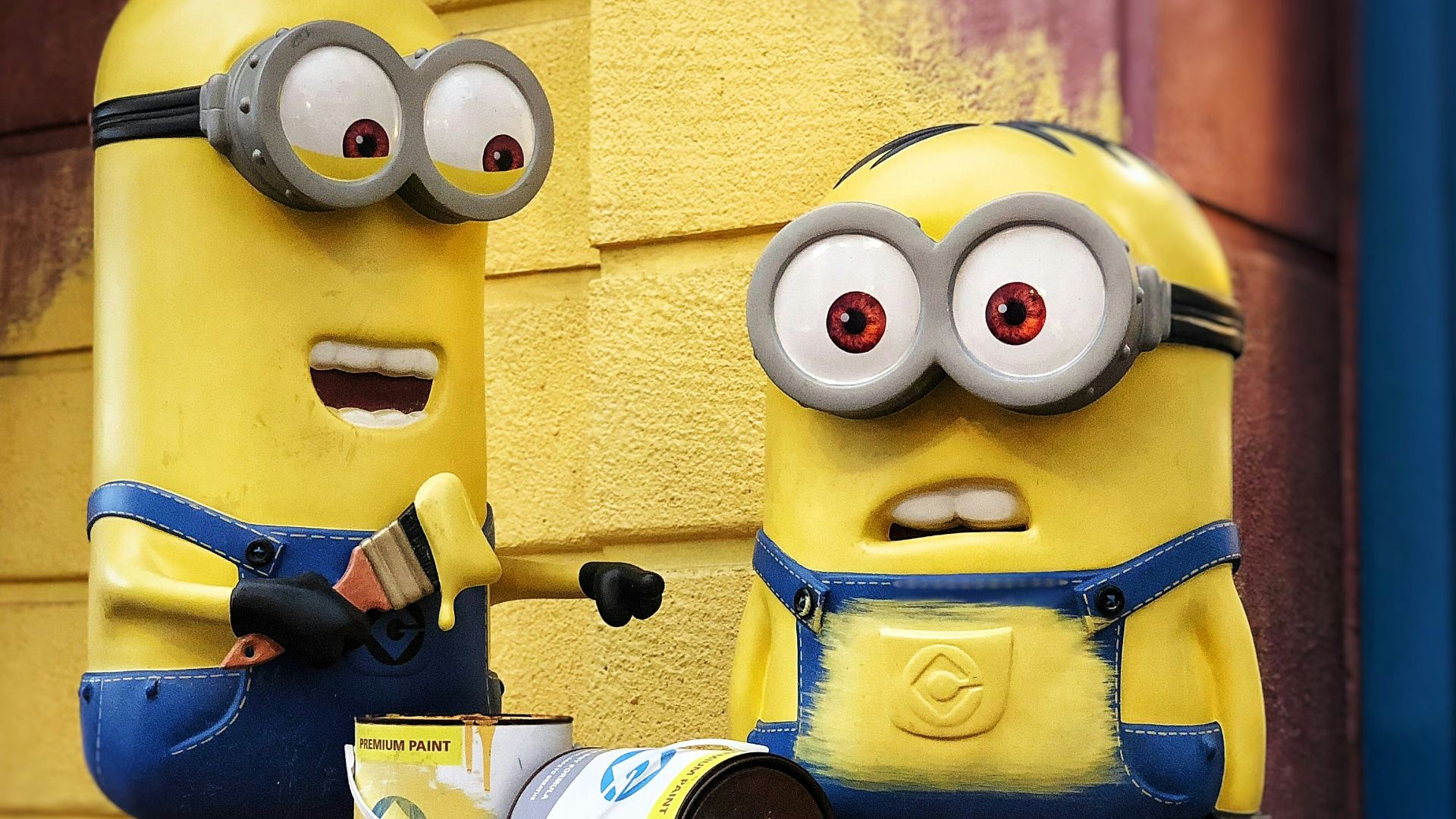 two Minions character figure on red table