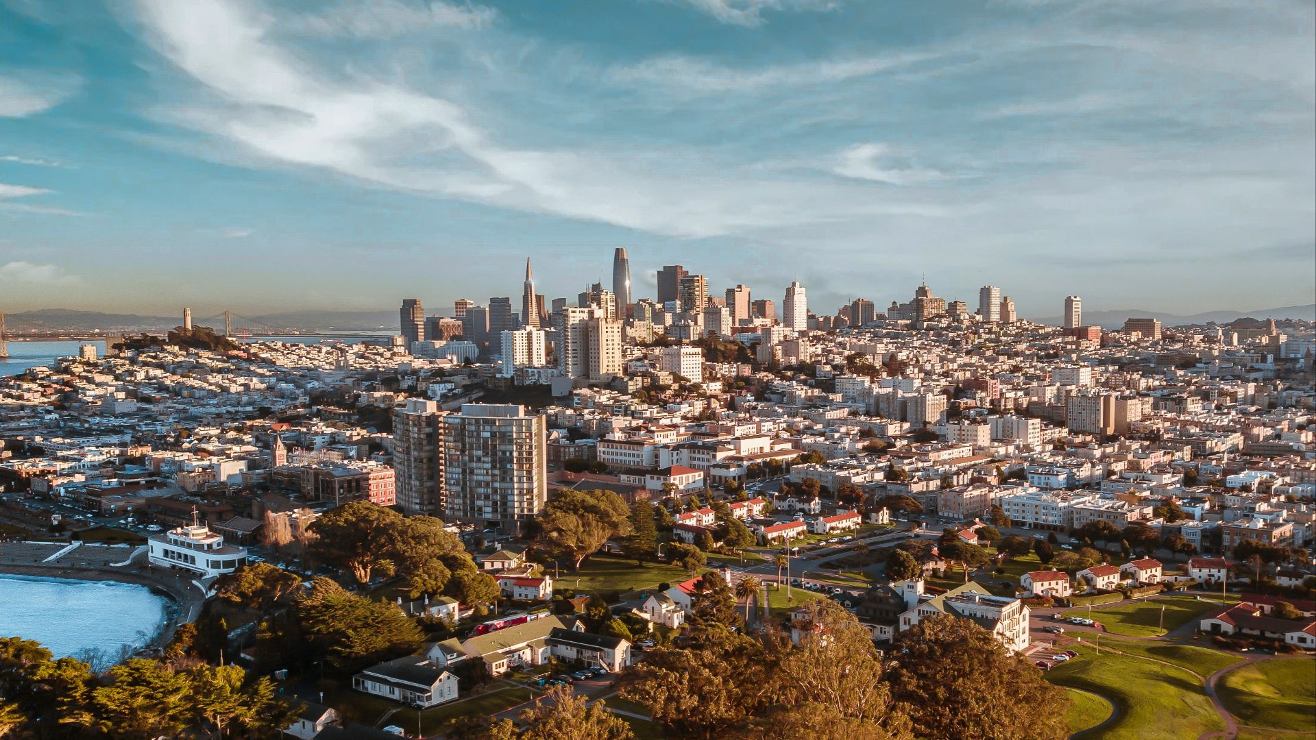 city skyline under blue sky during daytime