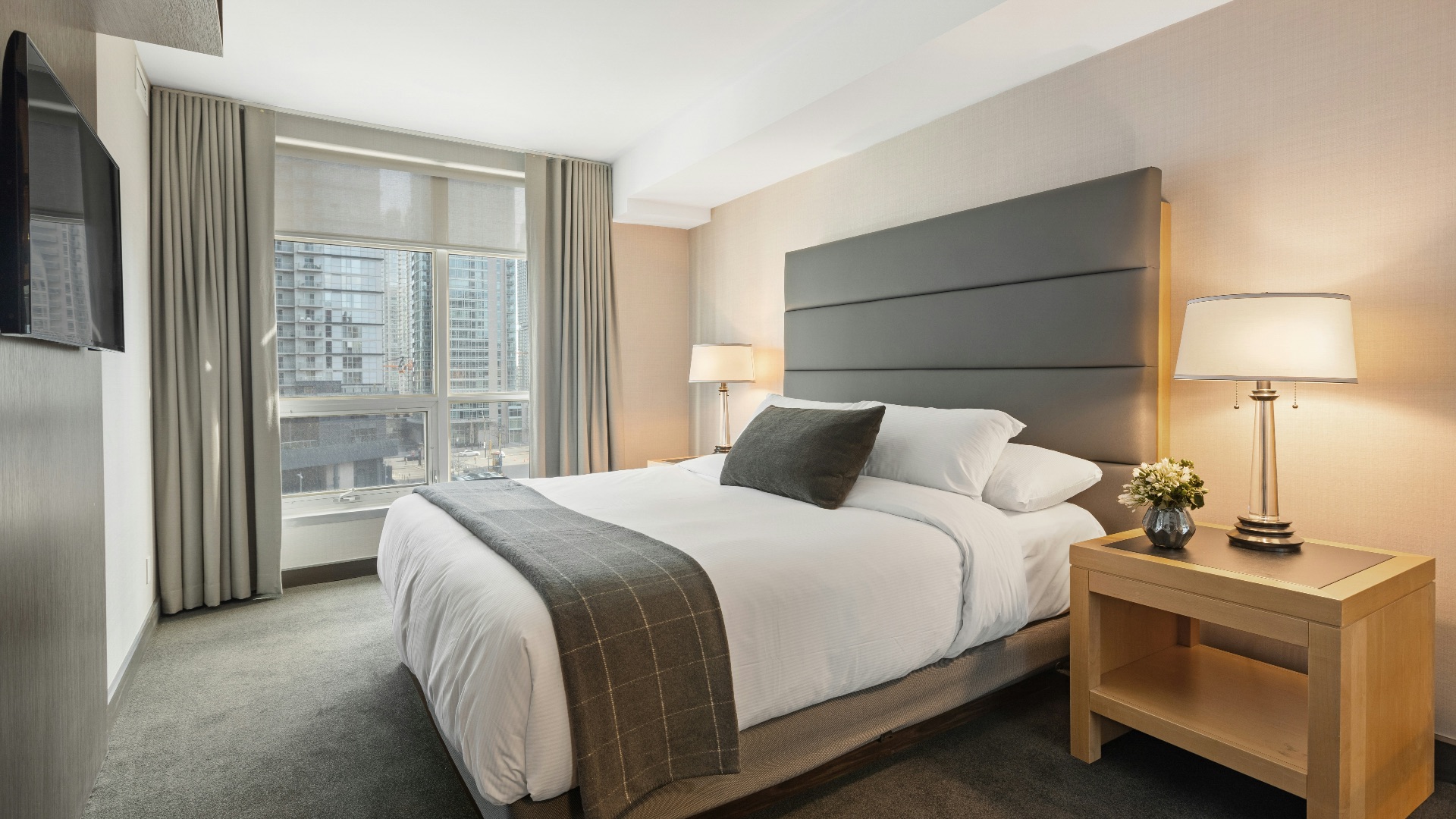 white bed linen on bed