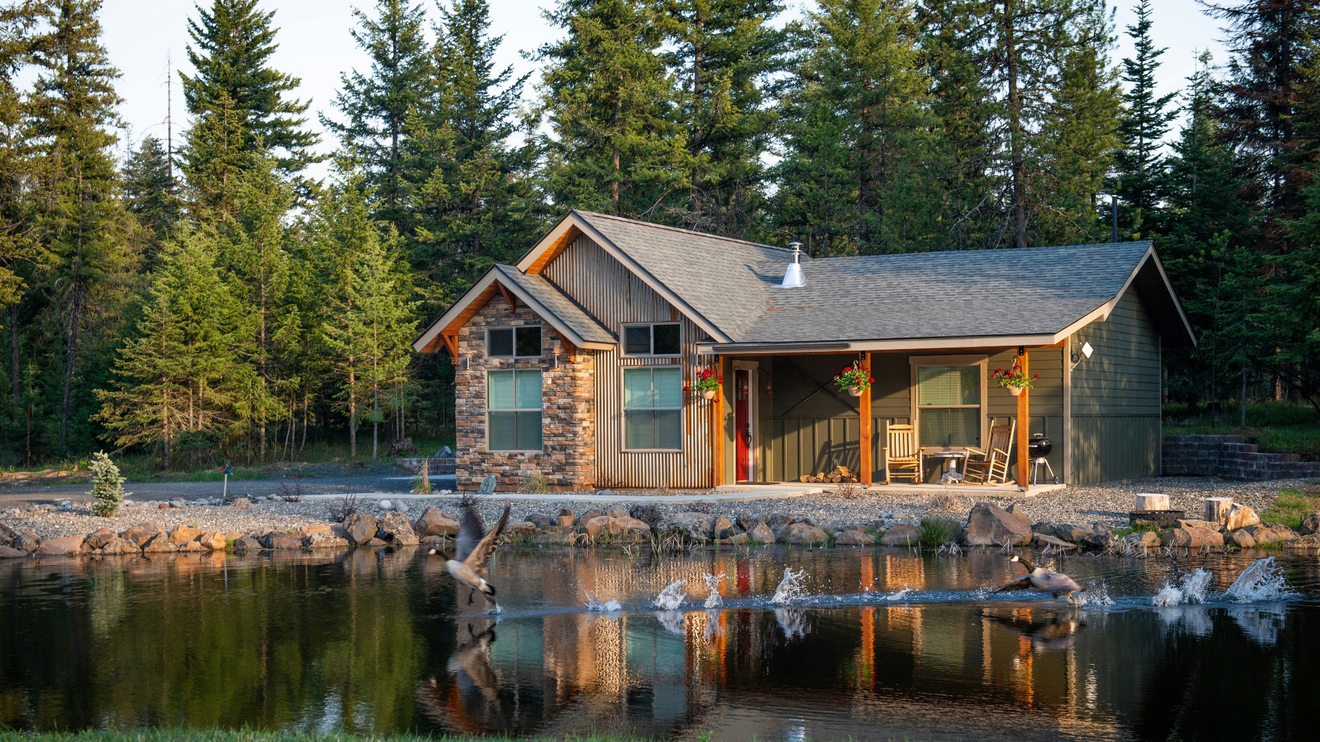 brown house beside body of water