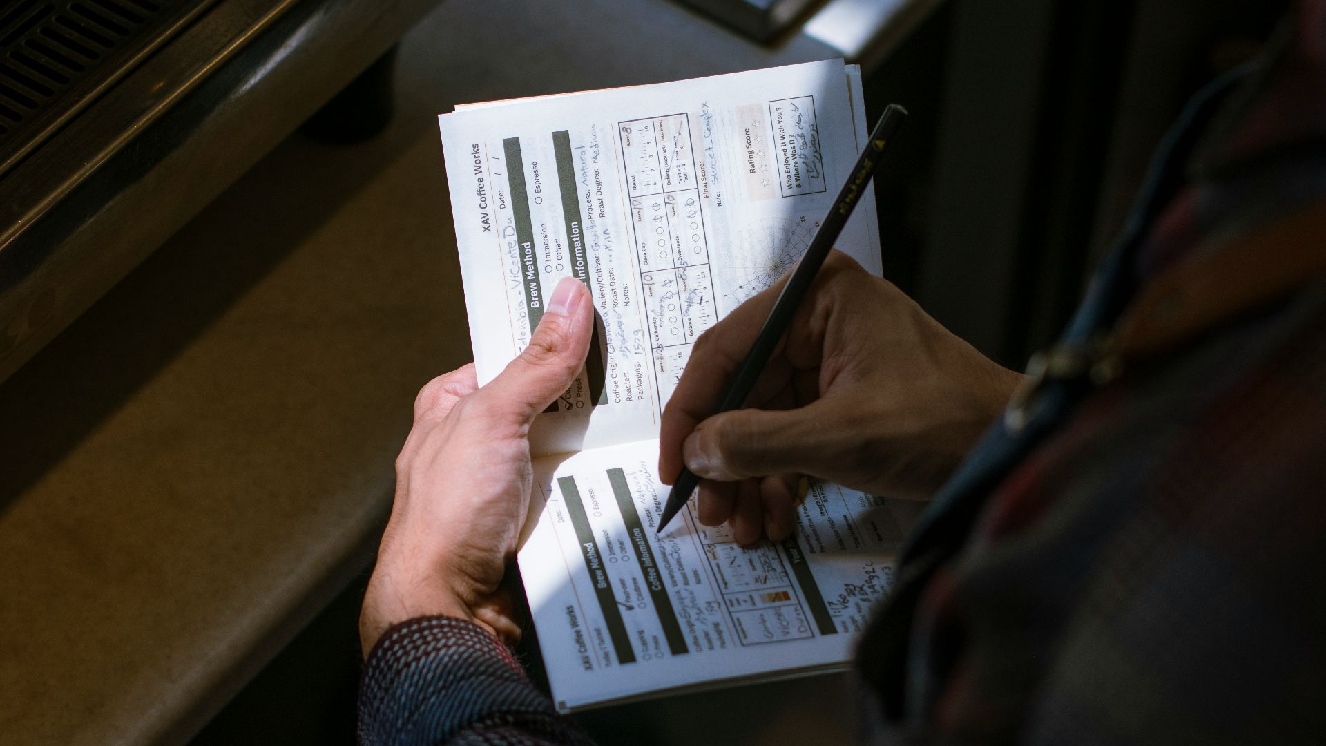 person holding white printer paper