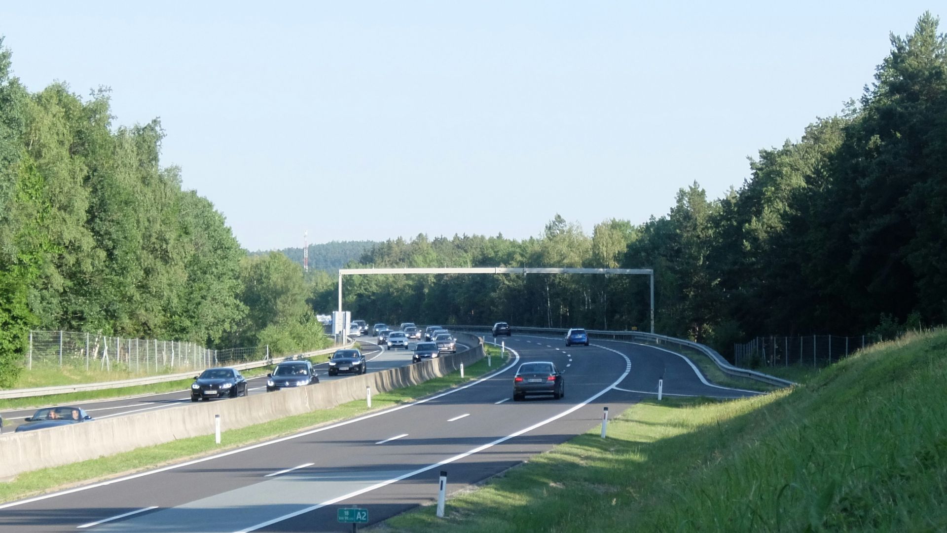 a highway with cars on it