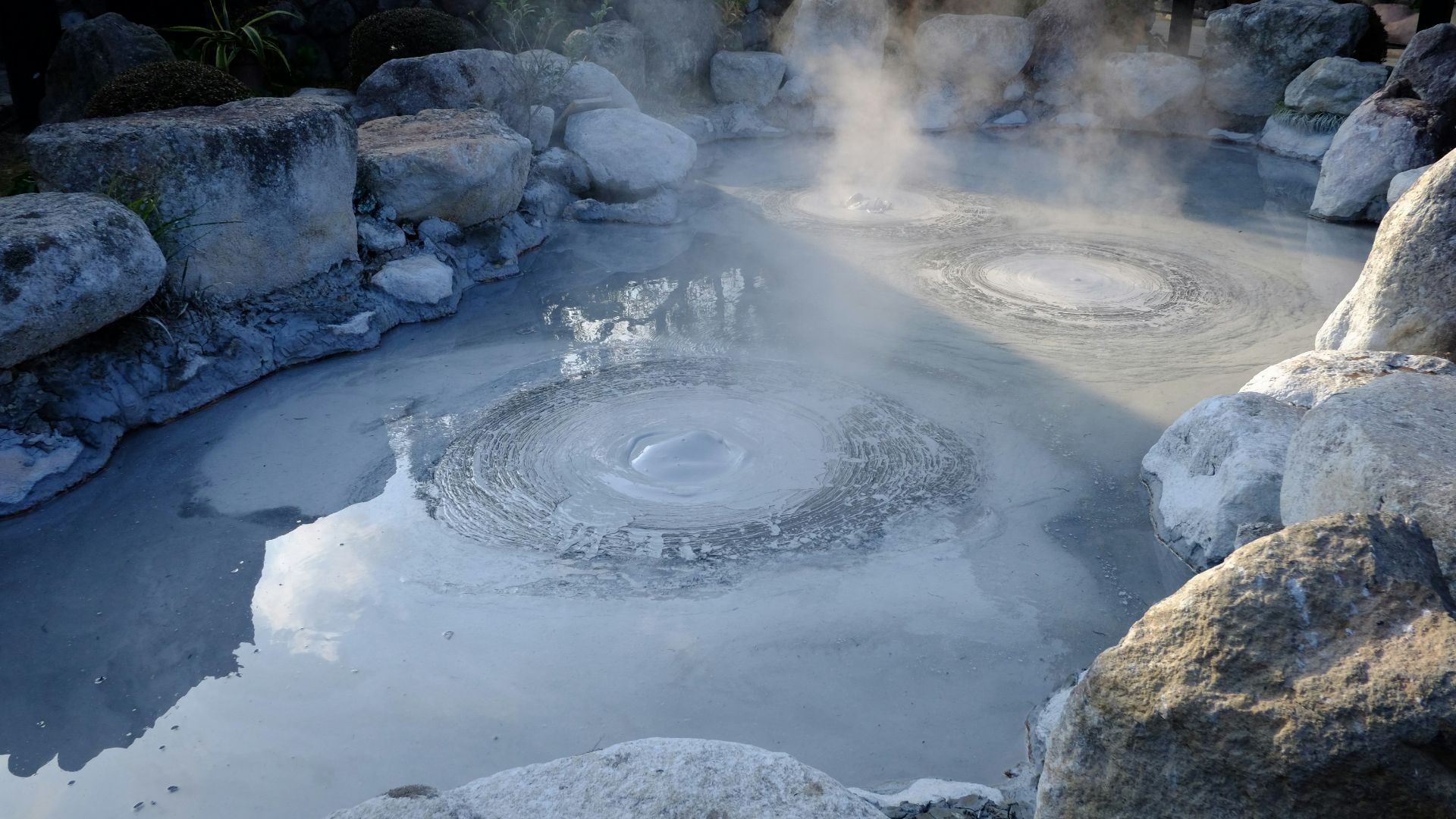 body of water on near rocks