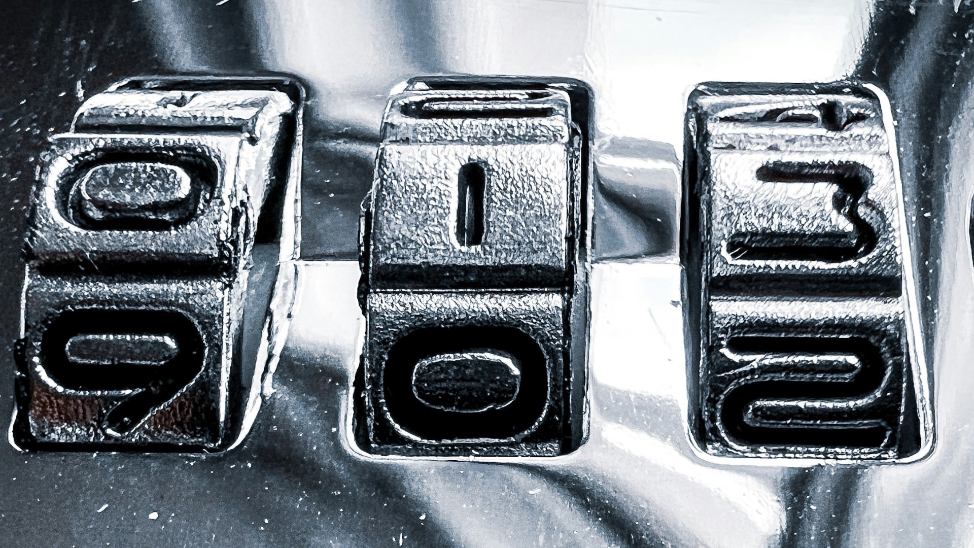 a close up of a metal plate with numbers on it