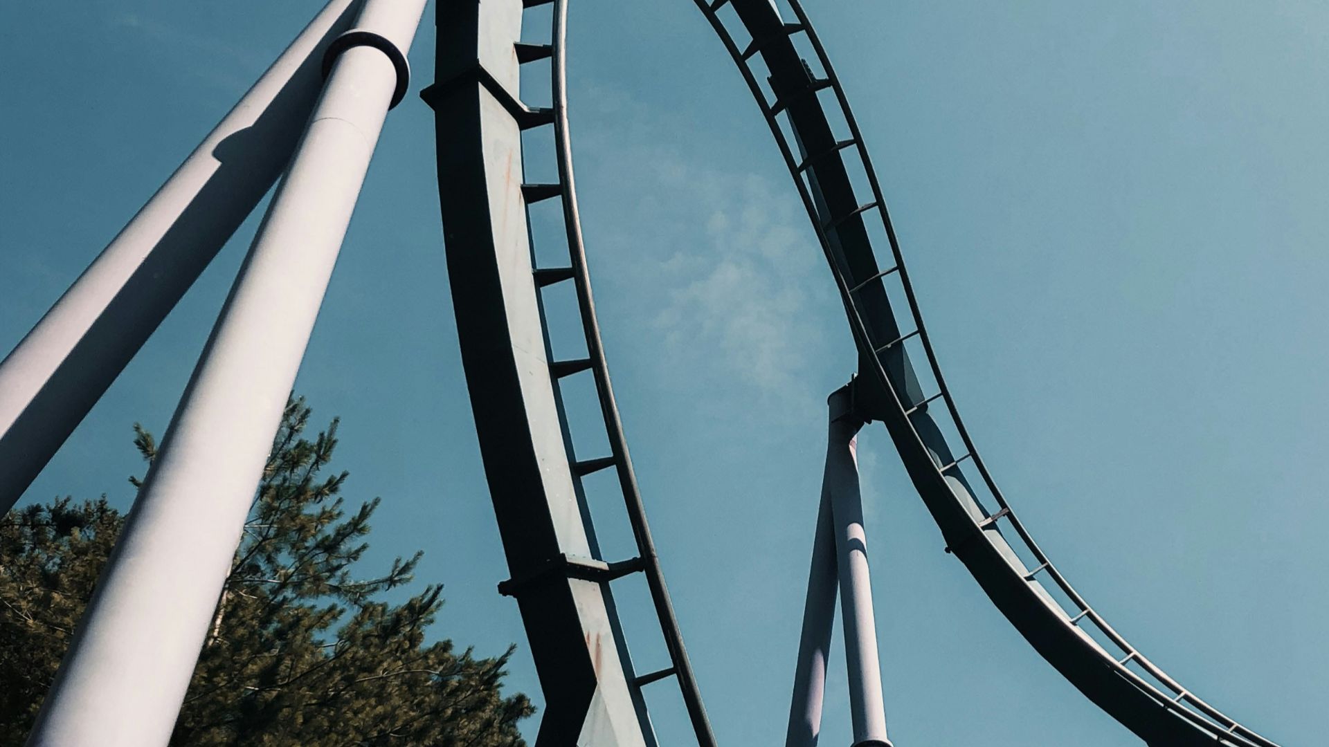 gray metal frame under blue sky during daytime