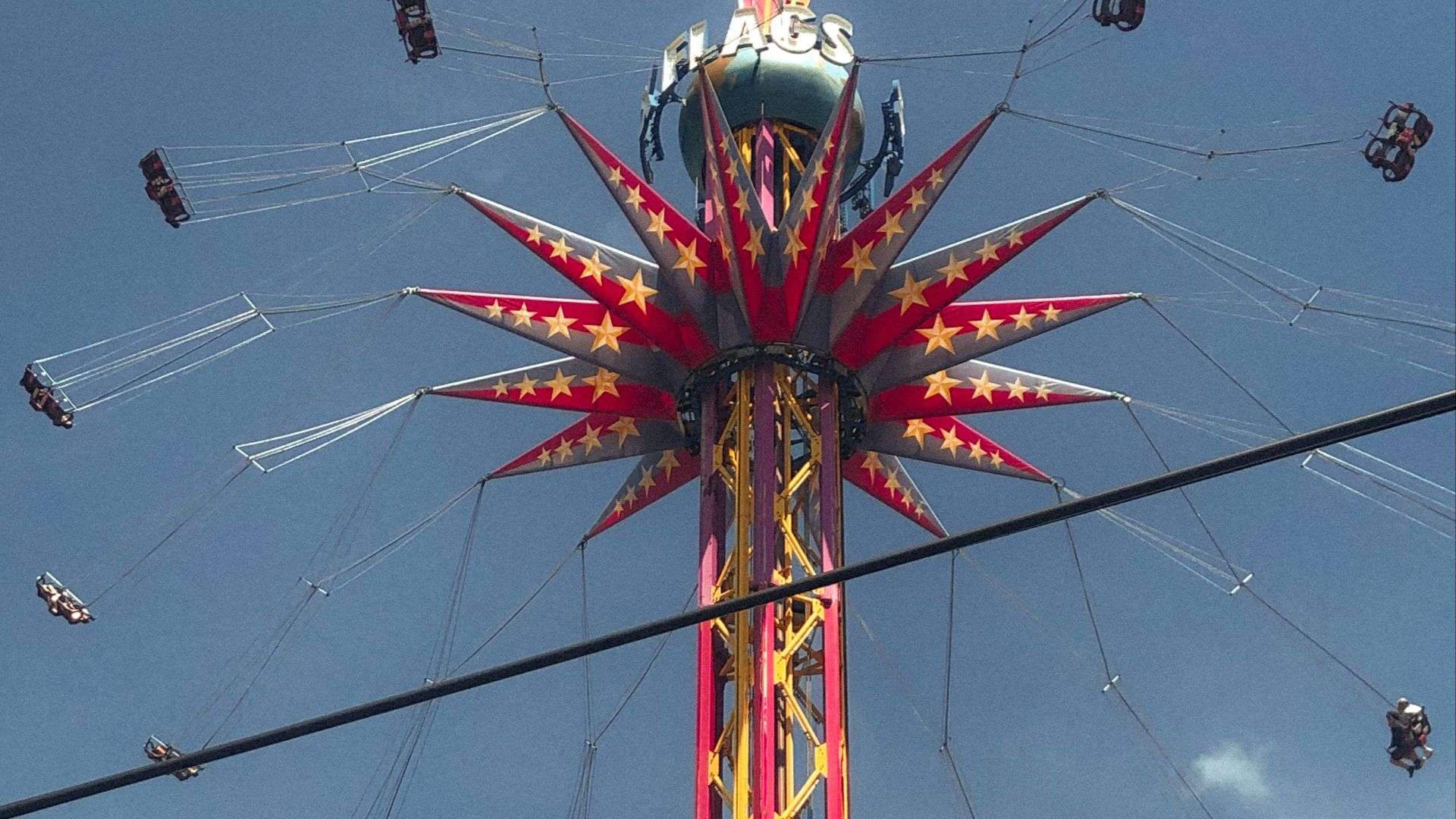 red and white metal tower