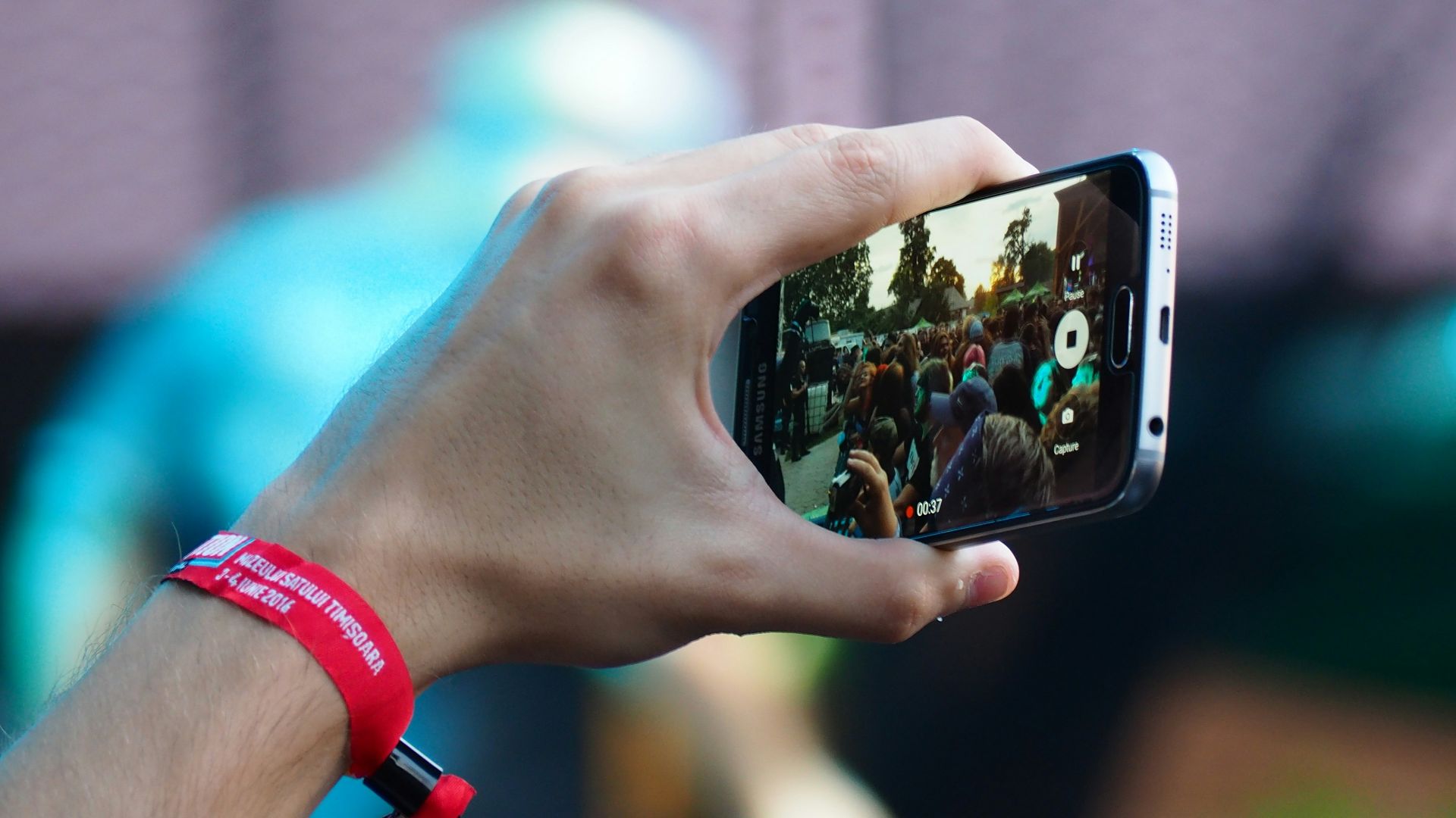 person using black smartphone