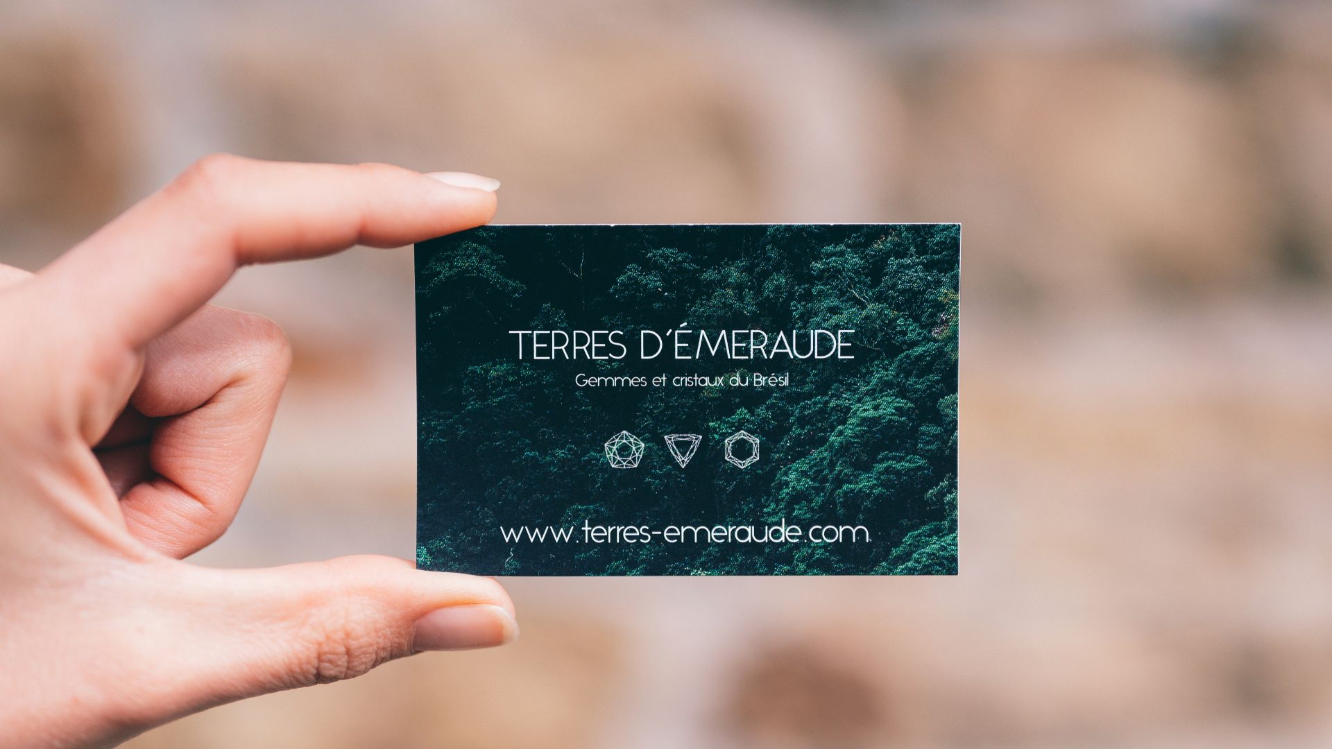 person holding black and white card