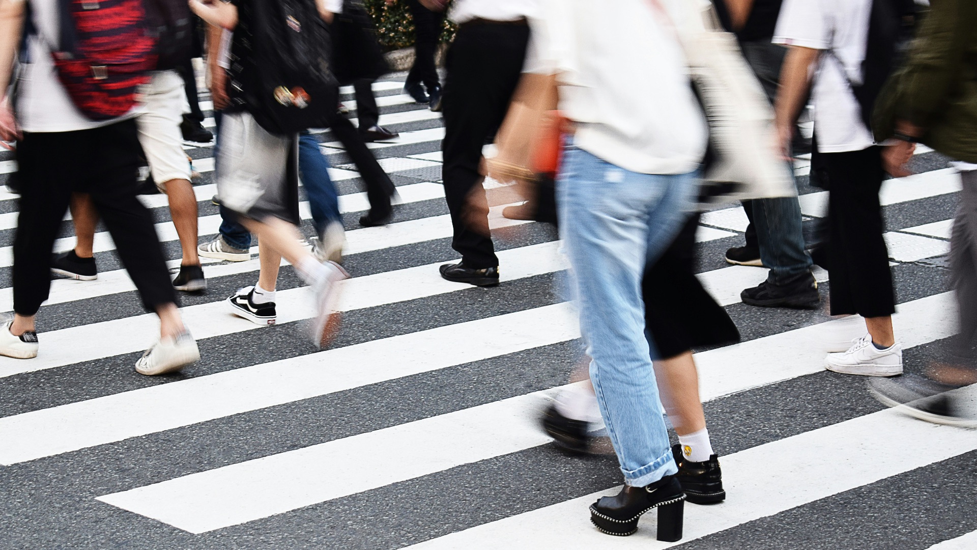 people walking on pedestrian lane during daytime