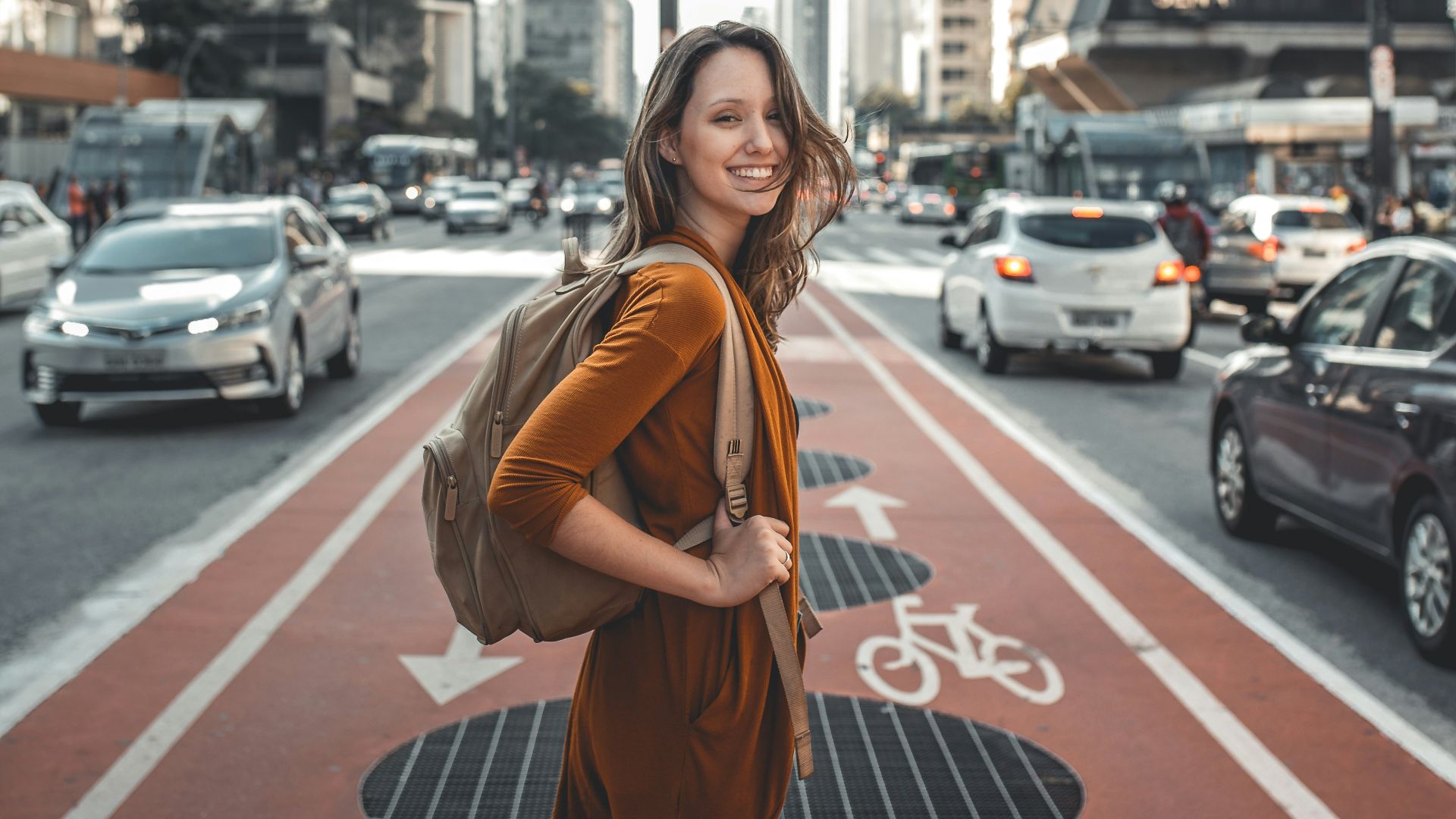 woman standing on middle of road
