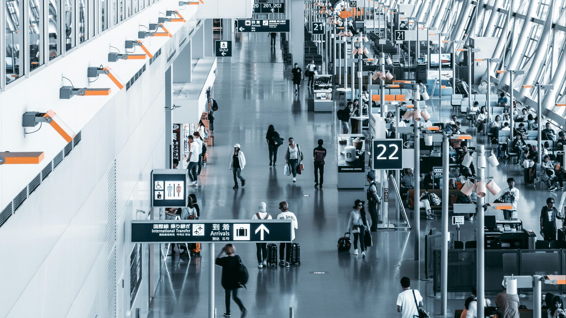 people walking inside airport station