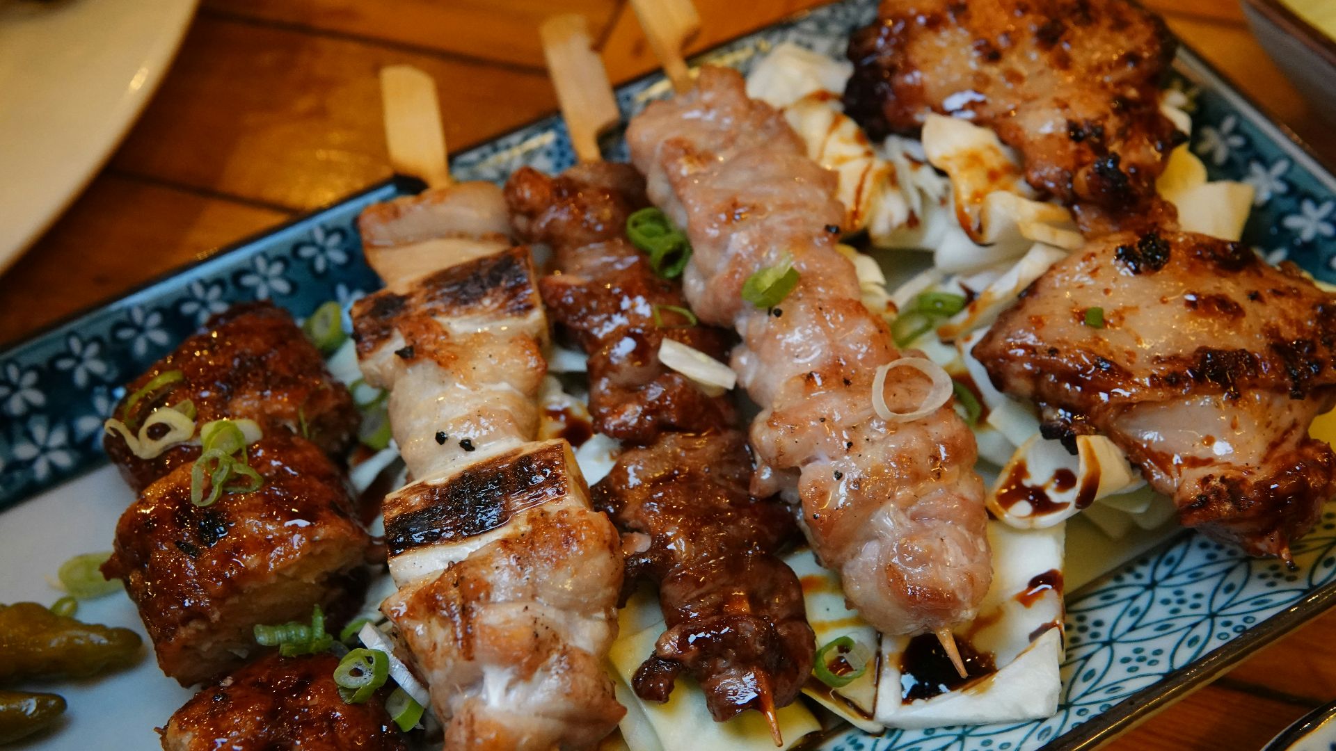 A plate of food on a wooden table