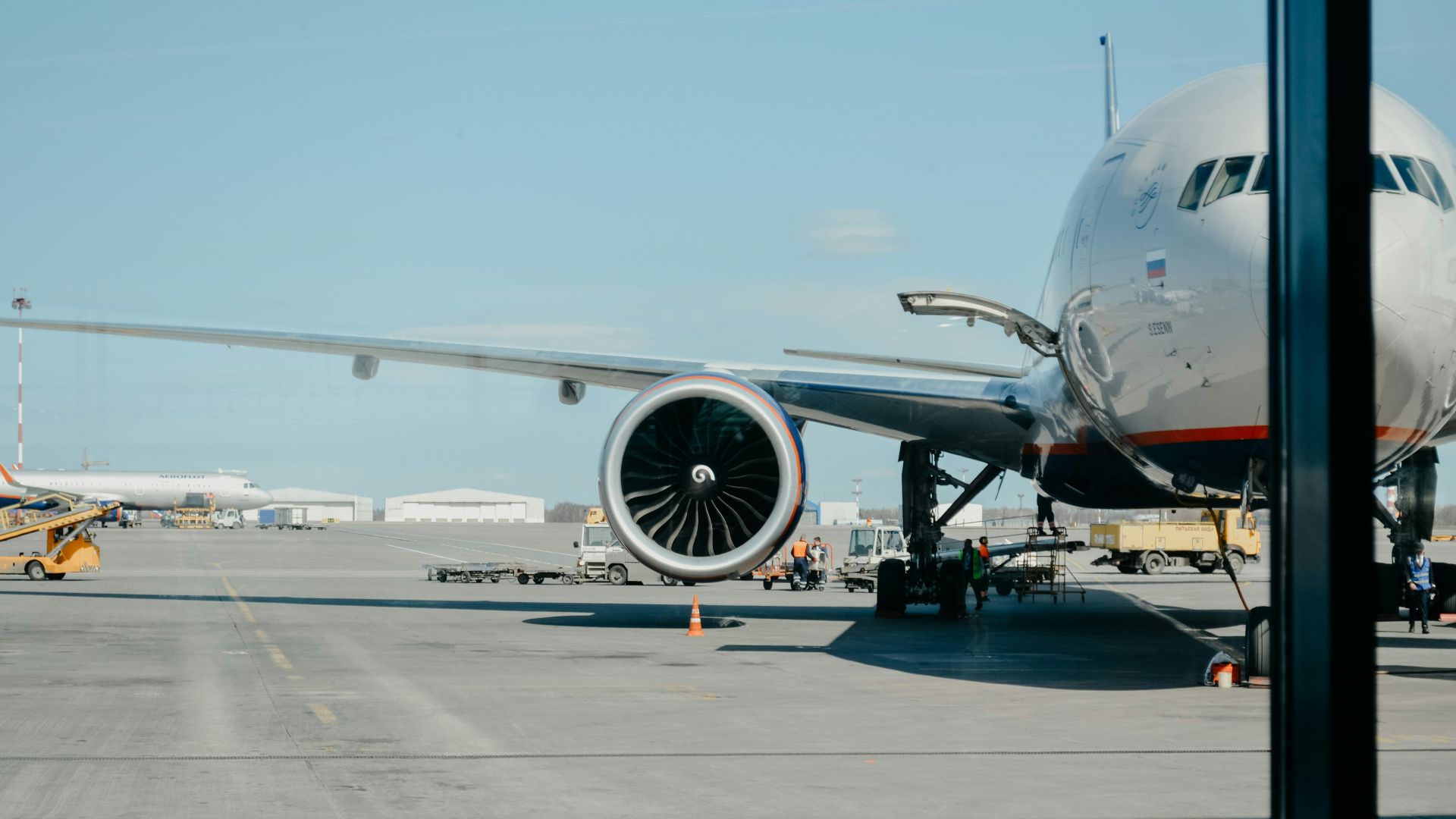 white airliner on runway