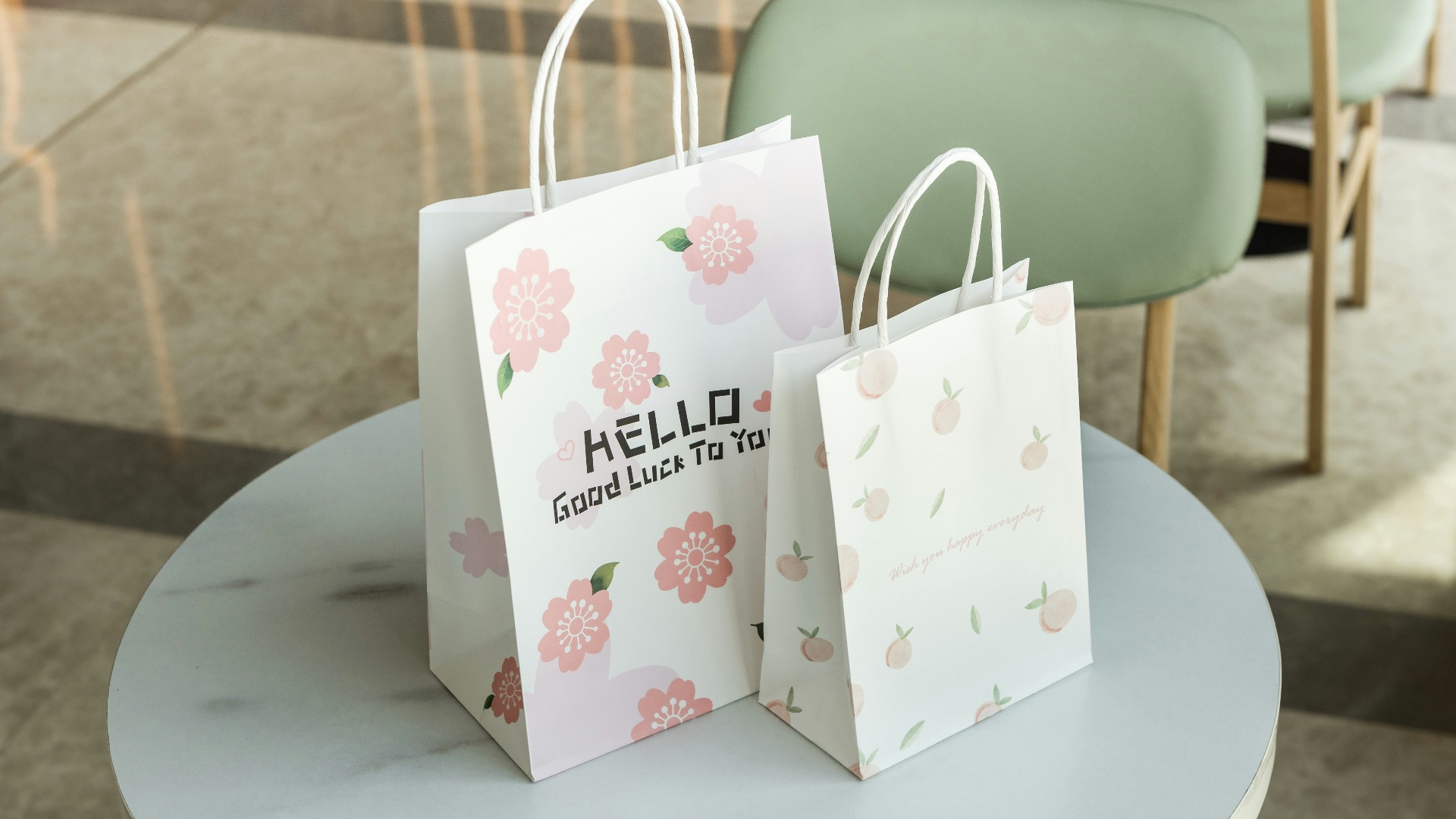 a couple of shopping bags on a table