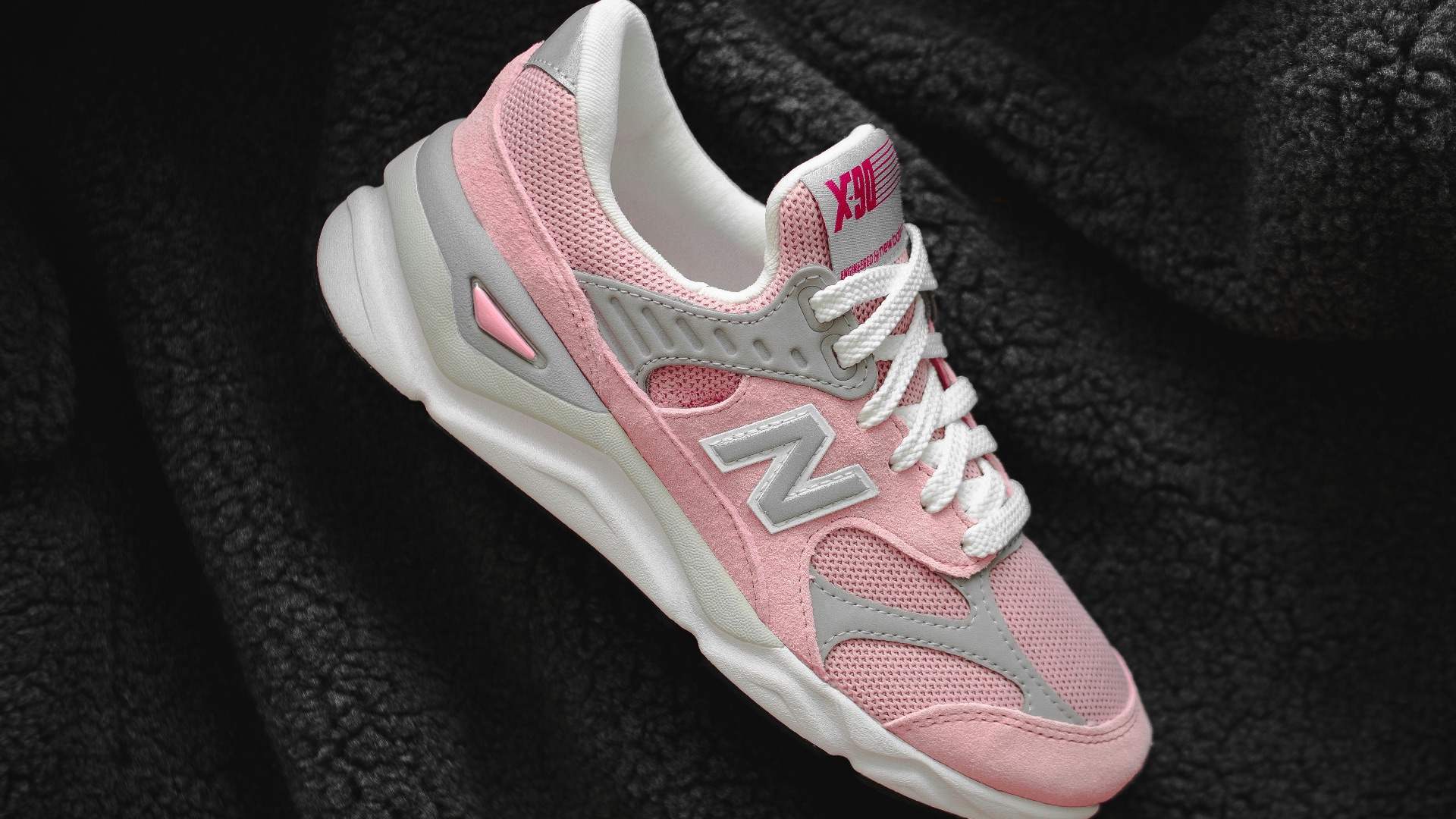 pink,grey,and white New Balance sneaker