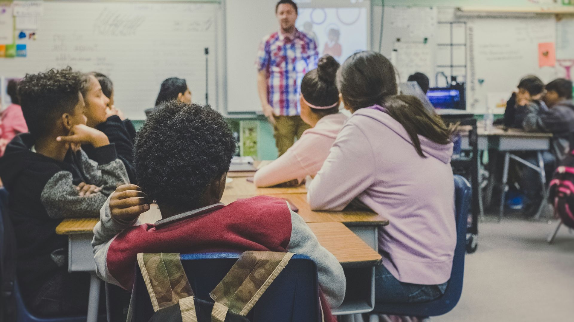 man and woman sitting on chairs