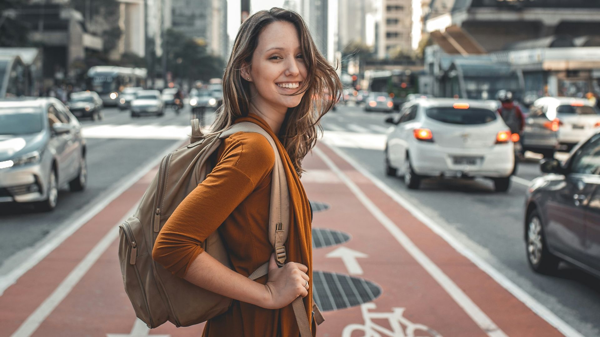 woman standing on middle of road