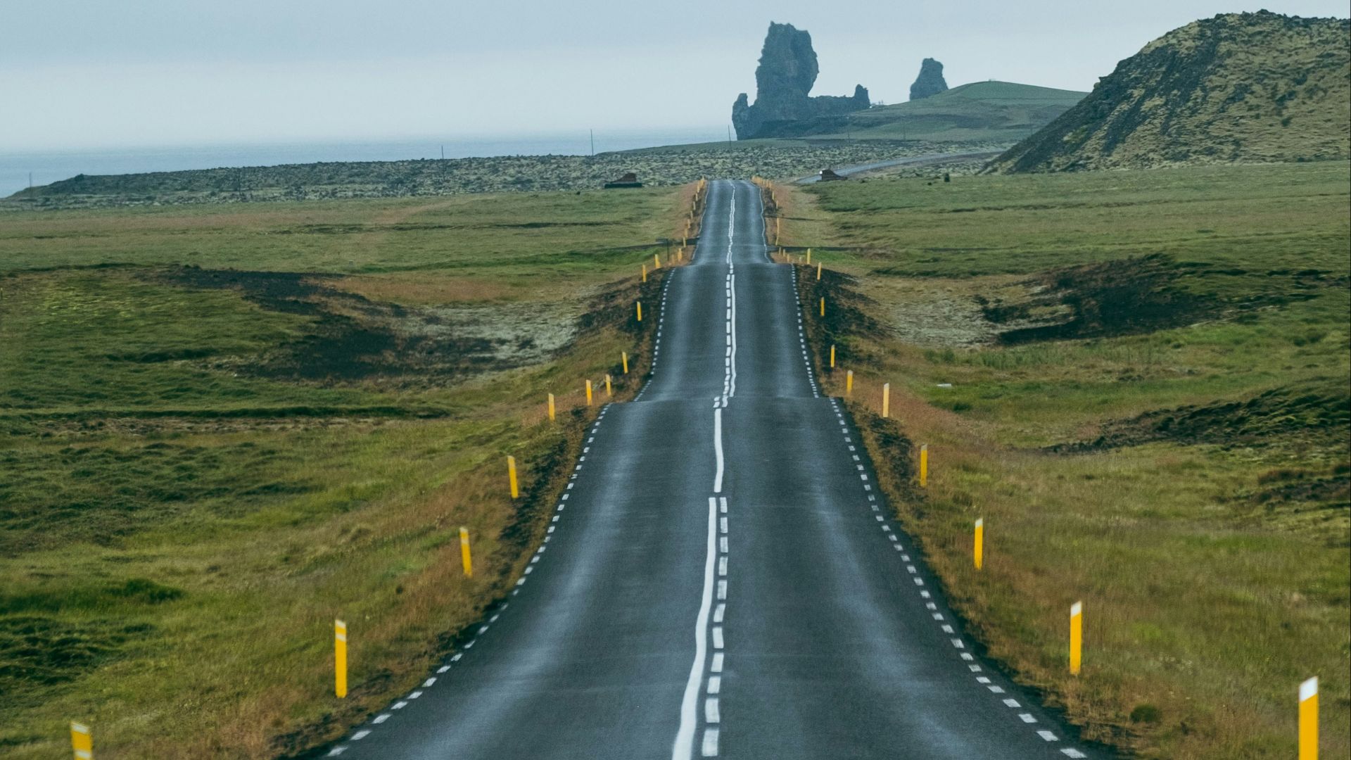 a long straight road in the middle of nowhere