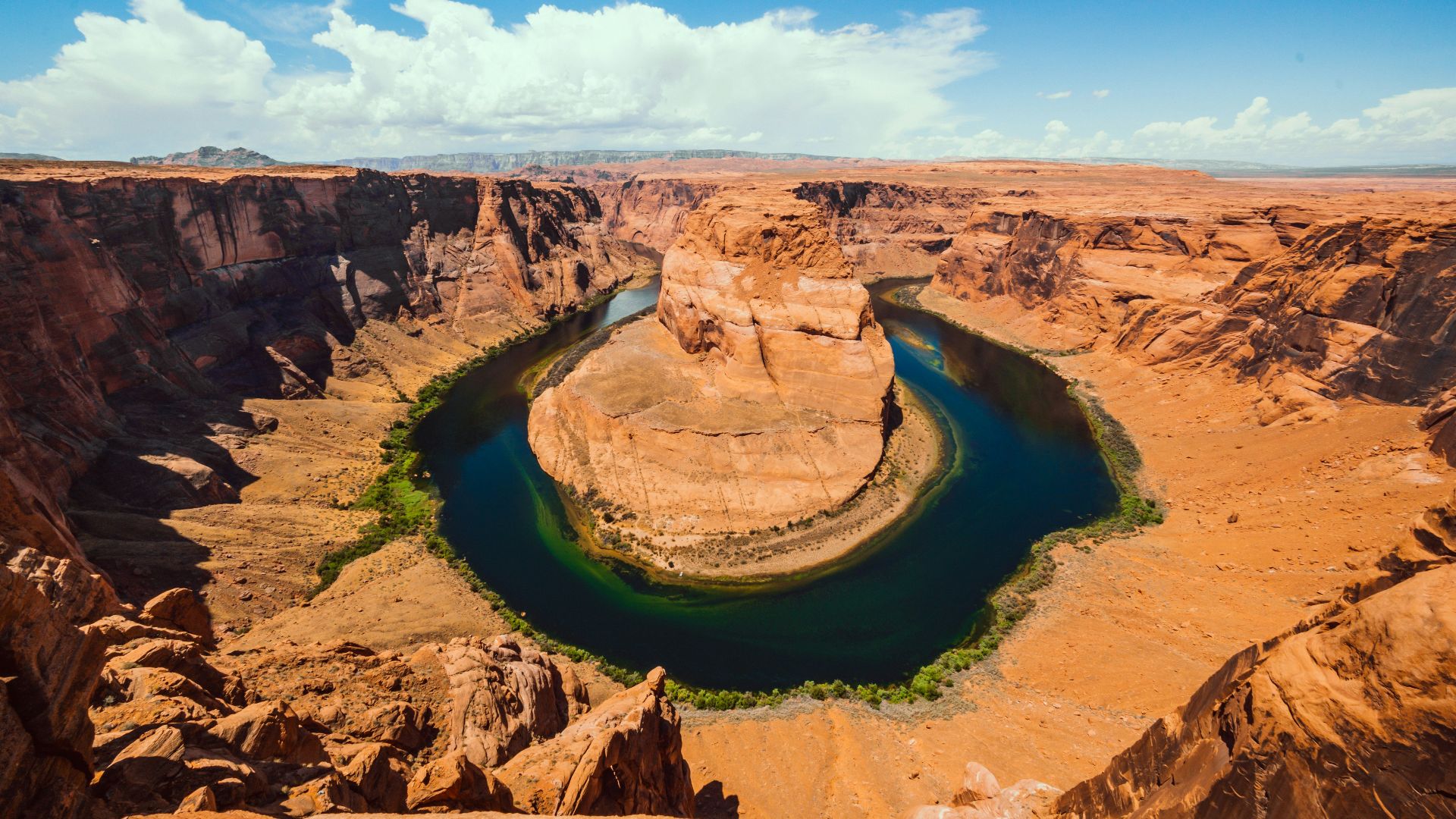 brown rock formation under blue sky during daytime