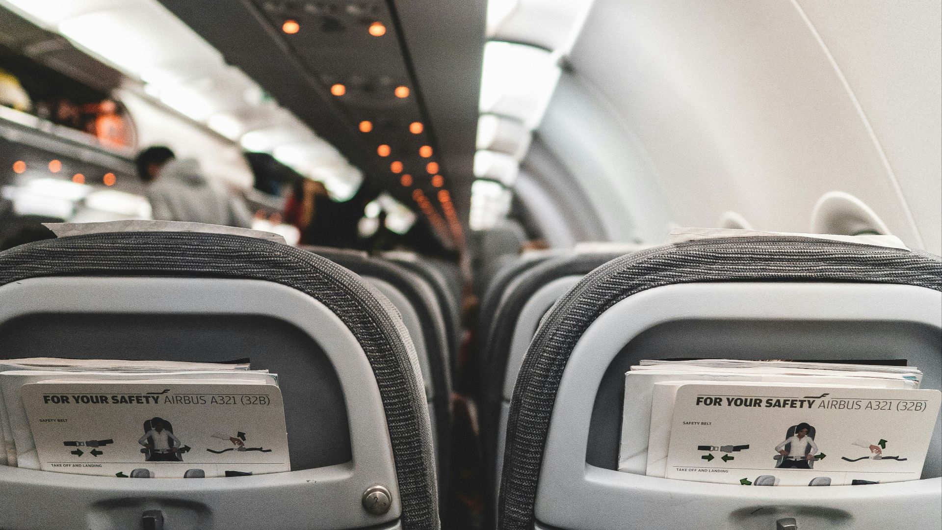 white and gray airplane seats