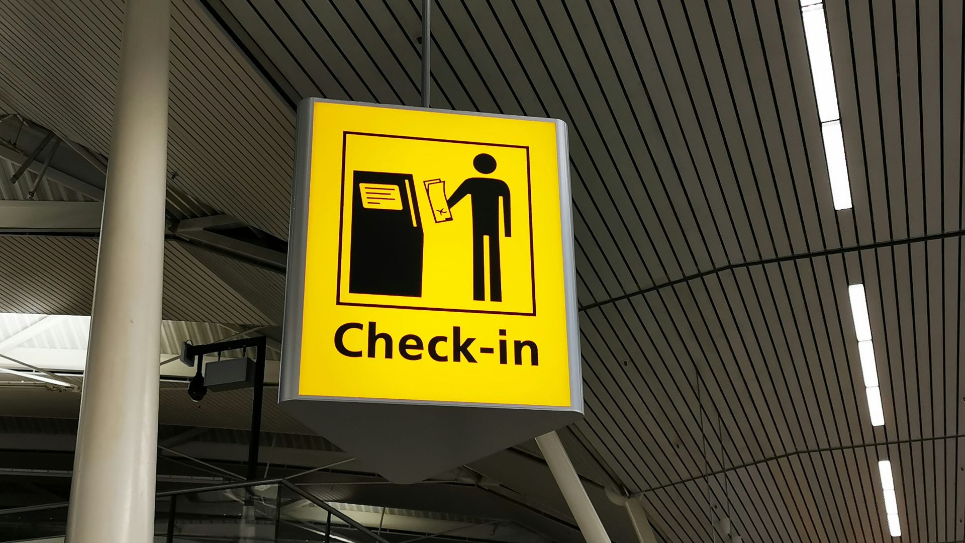 yellow and black no smoking sign