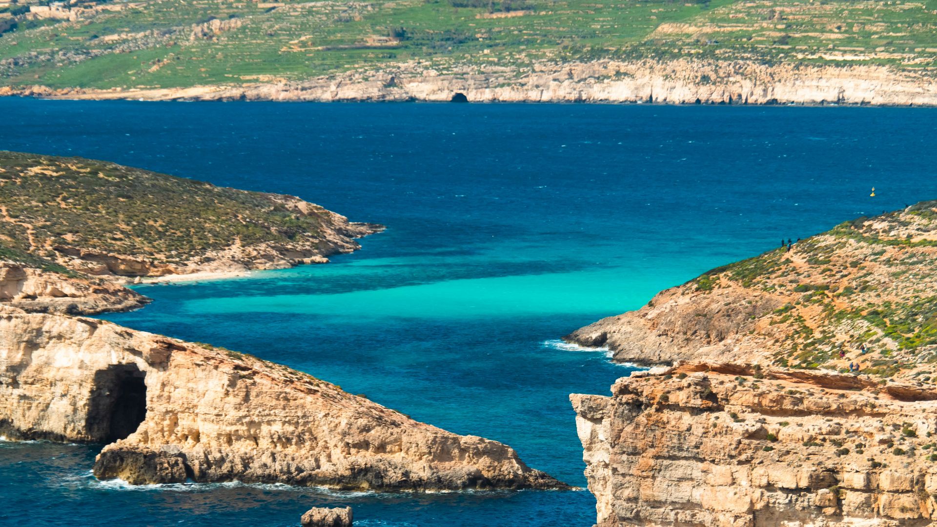 a large body of water surrounded by mountains