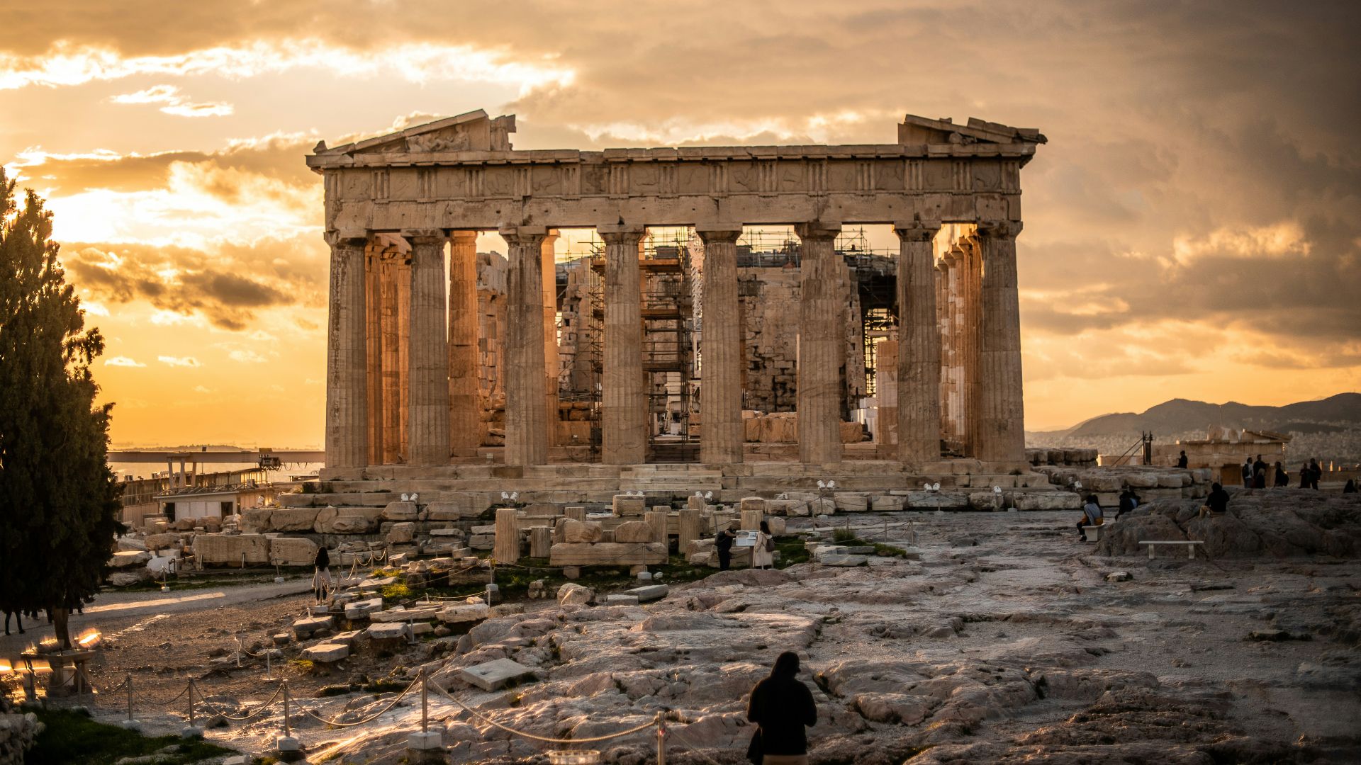 people walking near brown concrete building during daytime
