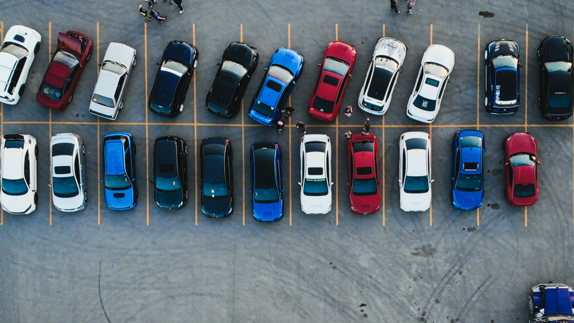 cars parked on parking lot during daytime