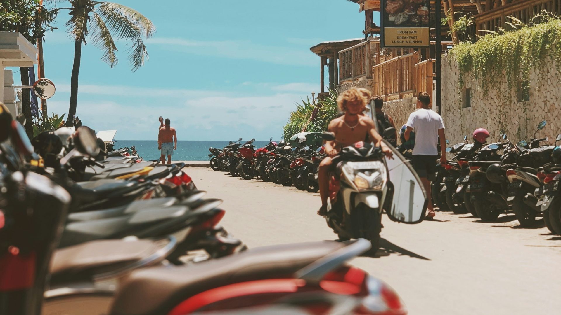 parked motorcycles near beach