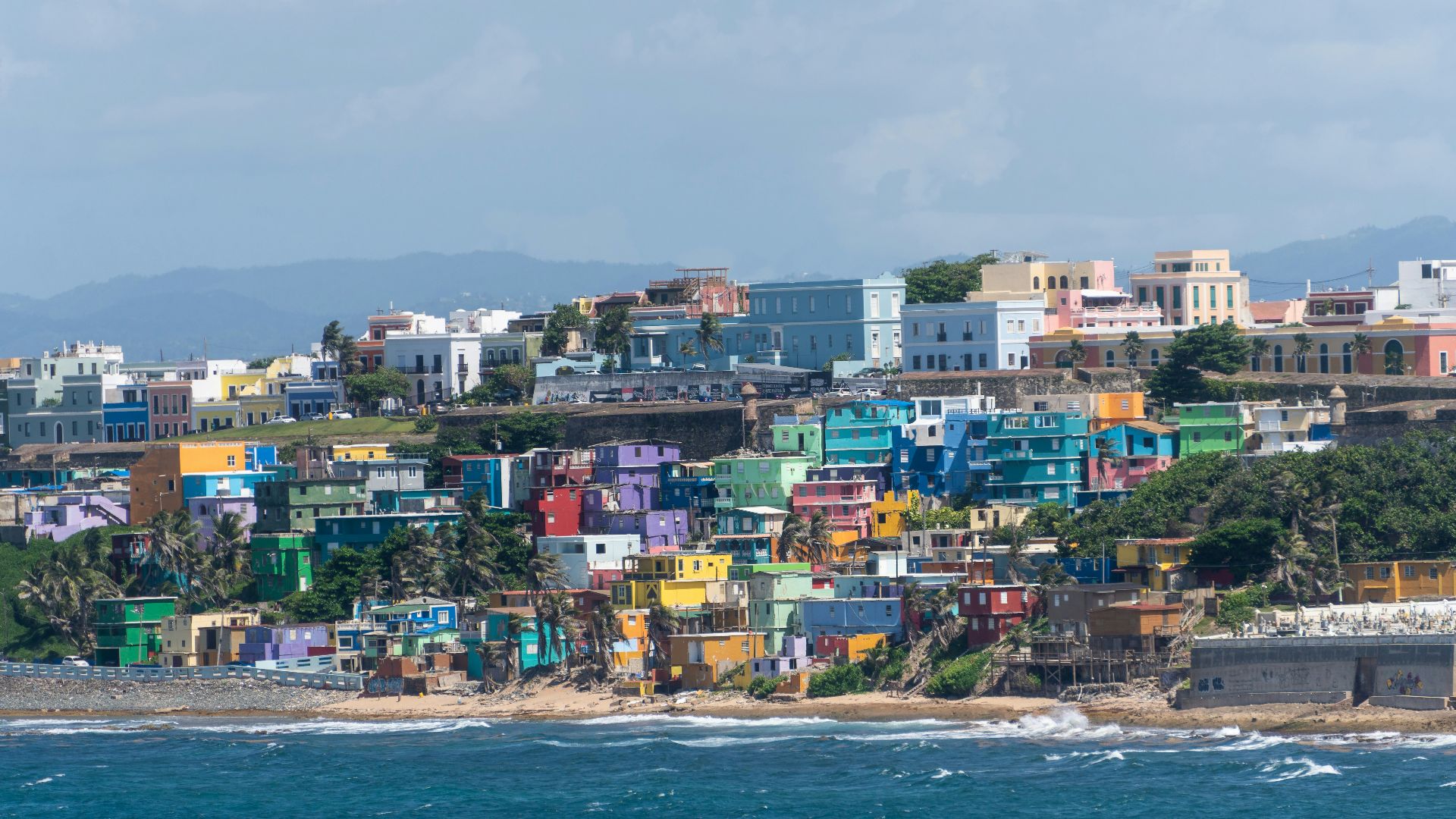 buildings beside ocean during daytime