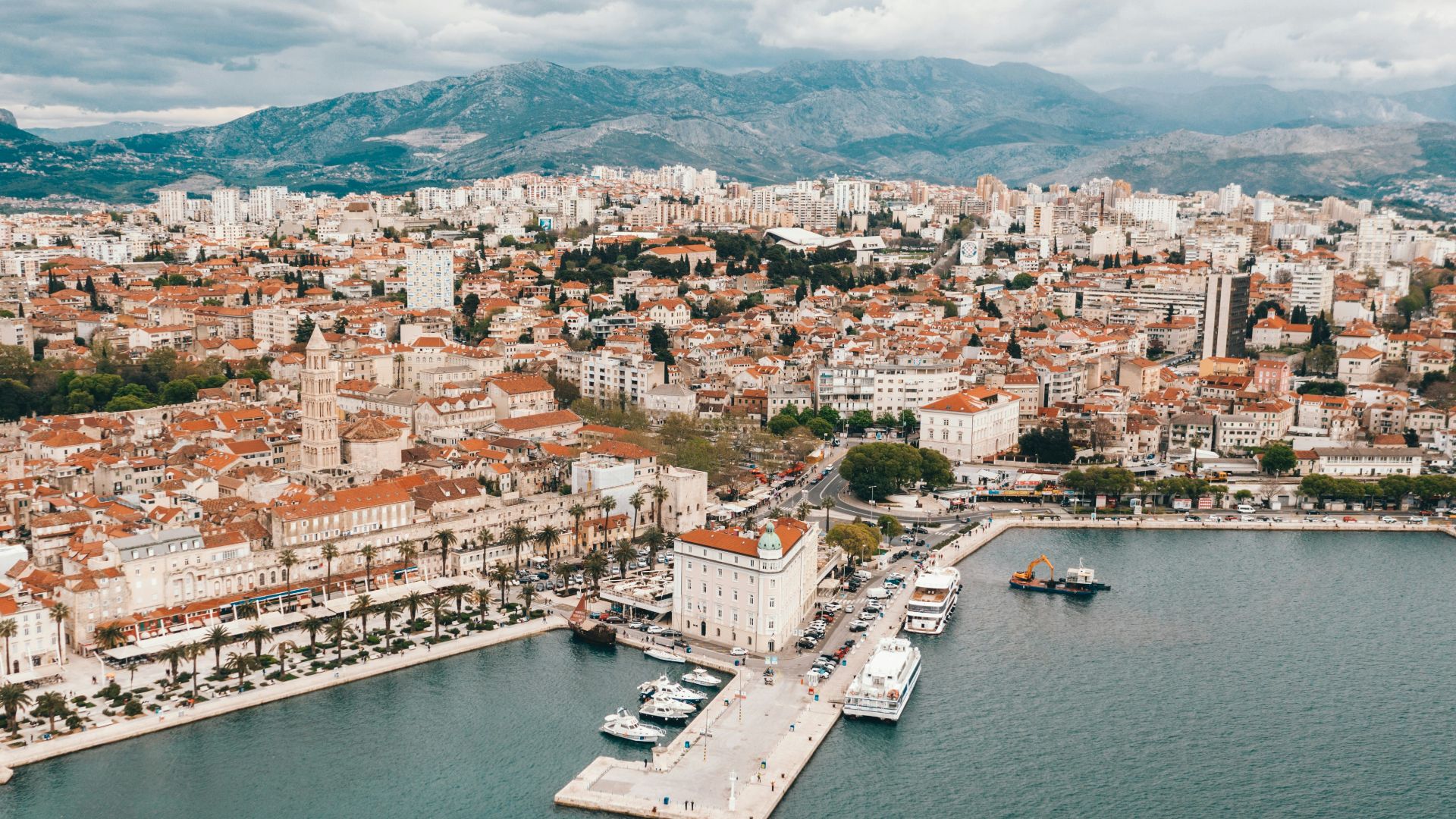 aerial view of building near body of water